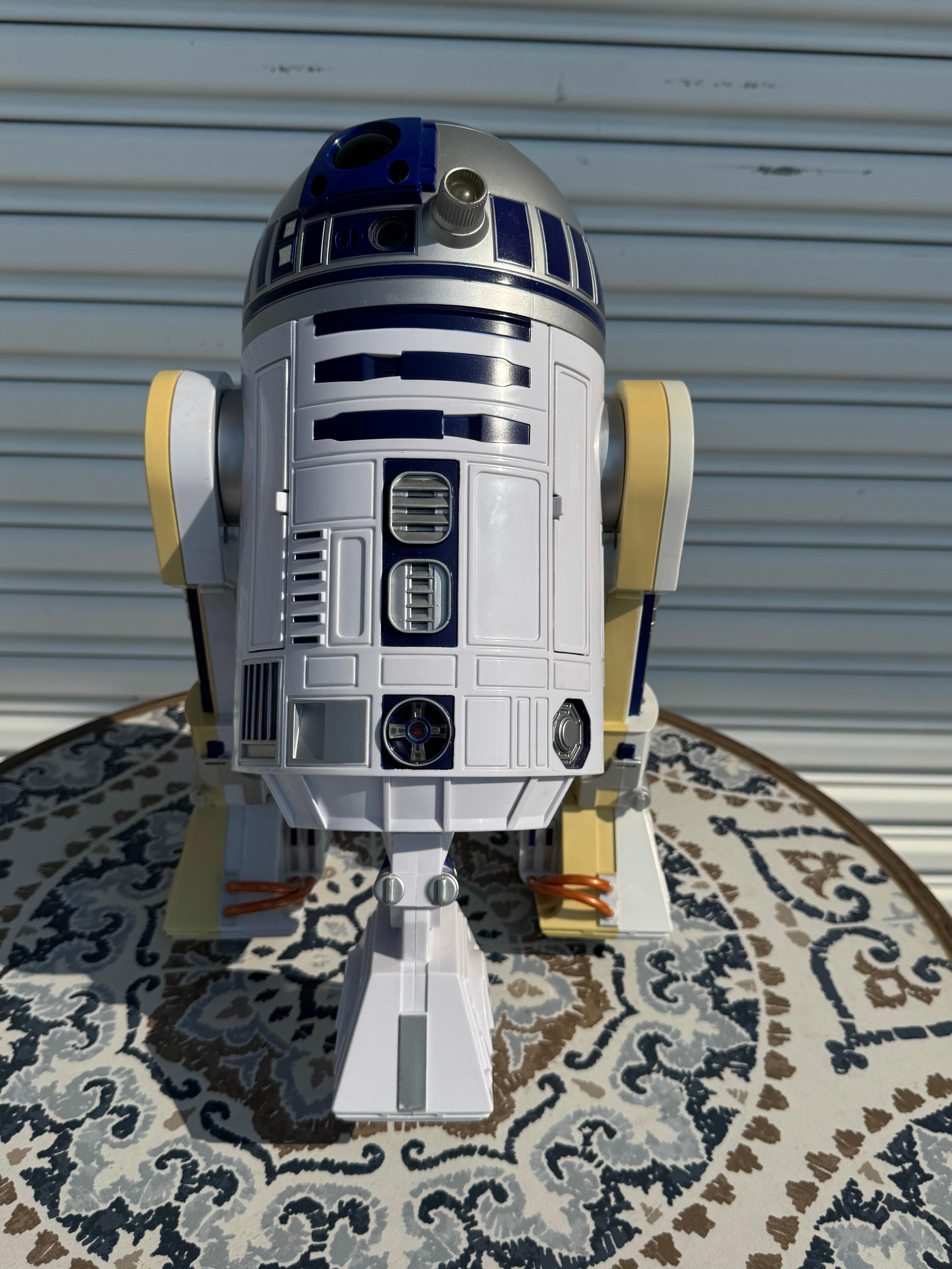 This robot is voice activated. 
It's in fabulous shape and works fine.
It comes with its original box.