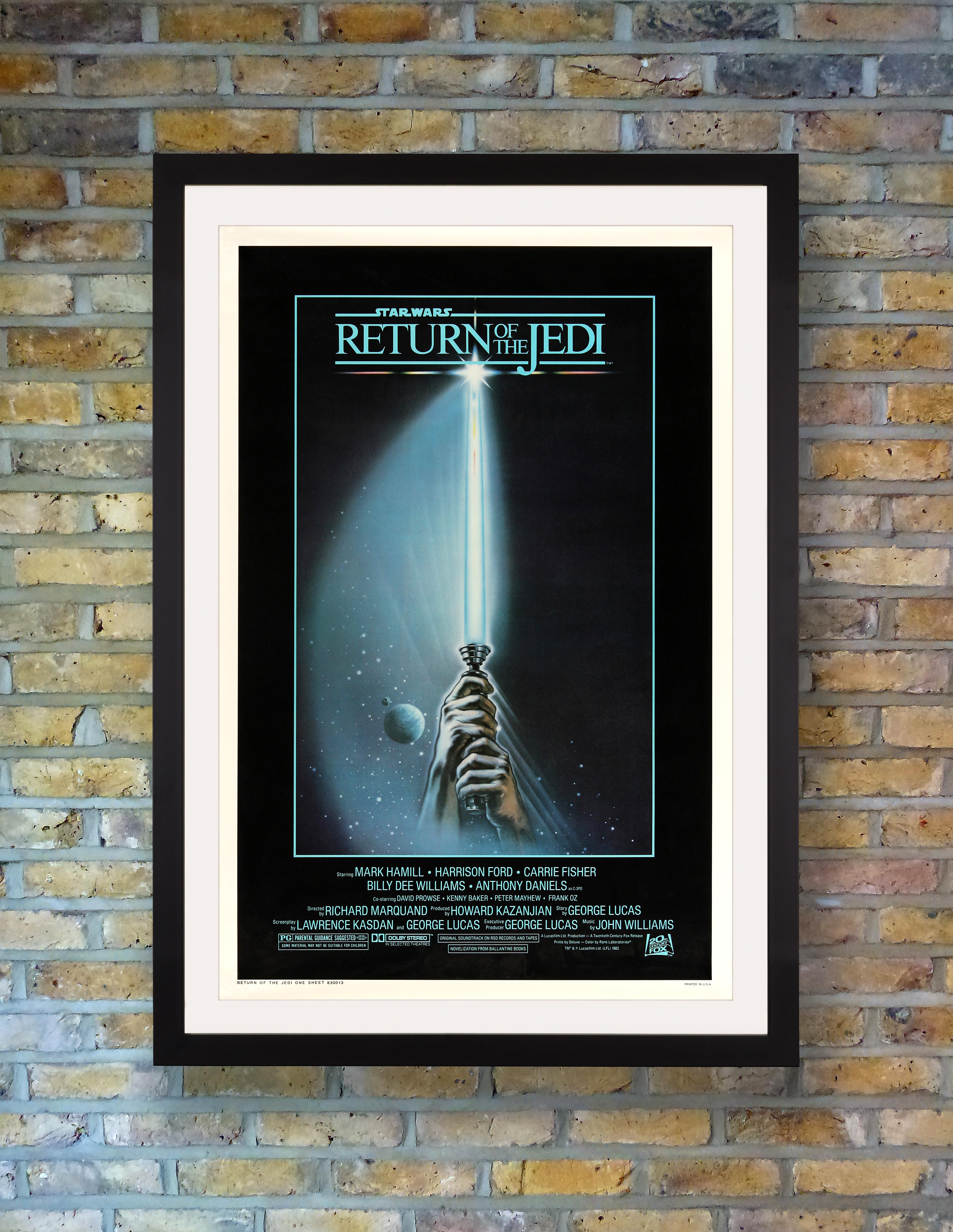 El sencillo y eficaz diseño del cartel de Tim Reamer para la última entrega de la trilogía original de La Guerra de las Galaxias de George Lucas se ha convertido en un emblema de toda la saga, con su sable láser resplandeciente saliendo de la