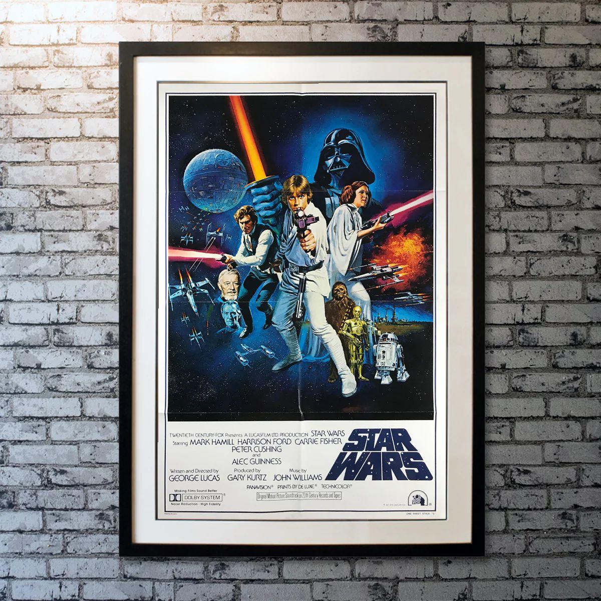Star Wars, Unframed Poster, 1977

Original One Sheet (27 X 41 Inches). Luke Skywalker joins forces with a Jedi Knight, a cocky pilot, a Wookiee and two droids to save the galaxy from the Empire's world-destroying battle station, while also