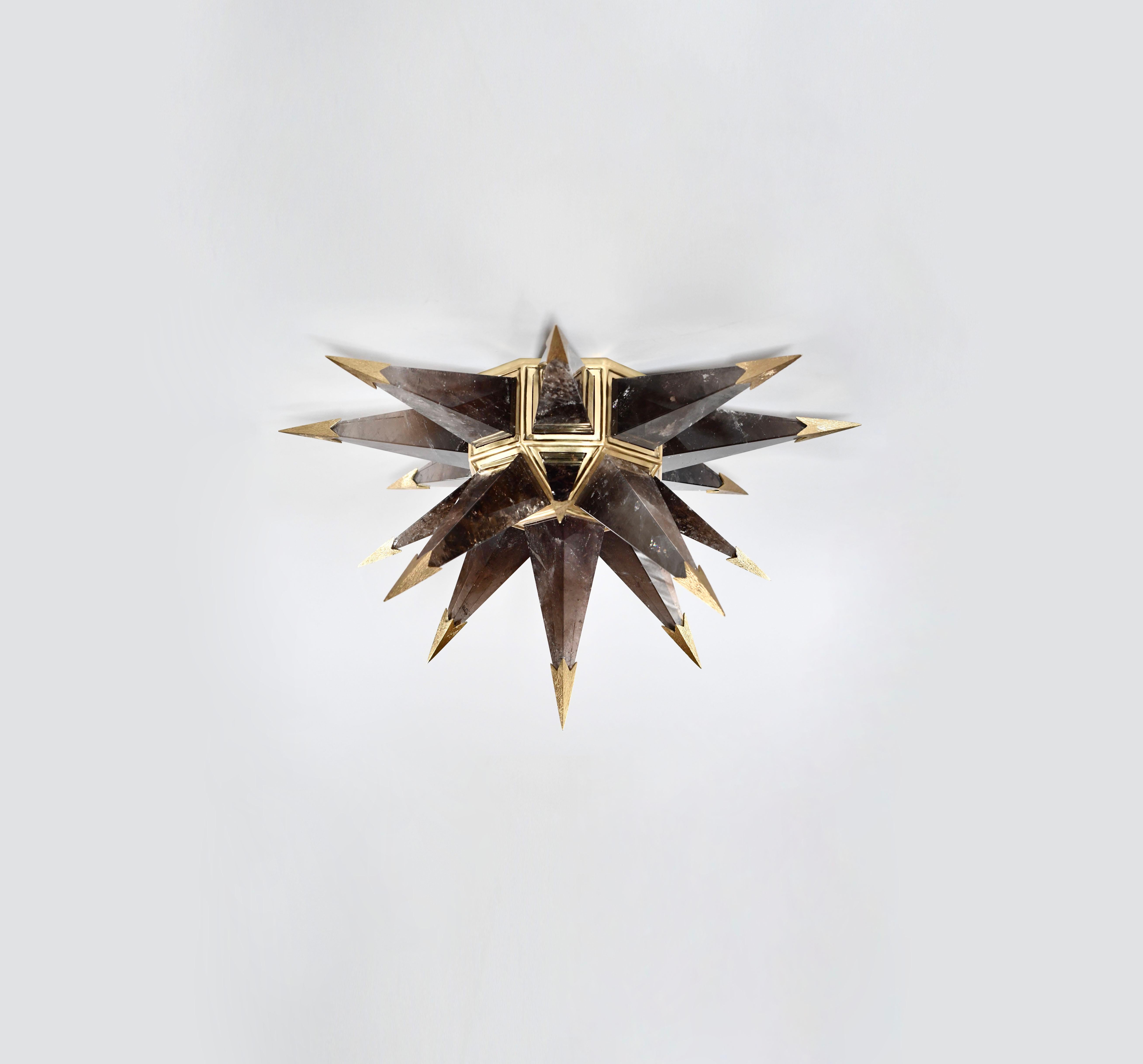 Star form smoky rock crystal flushmount with polish brass frame and tip. Created by Phoenix Gallery, NYC.