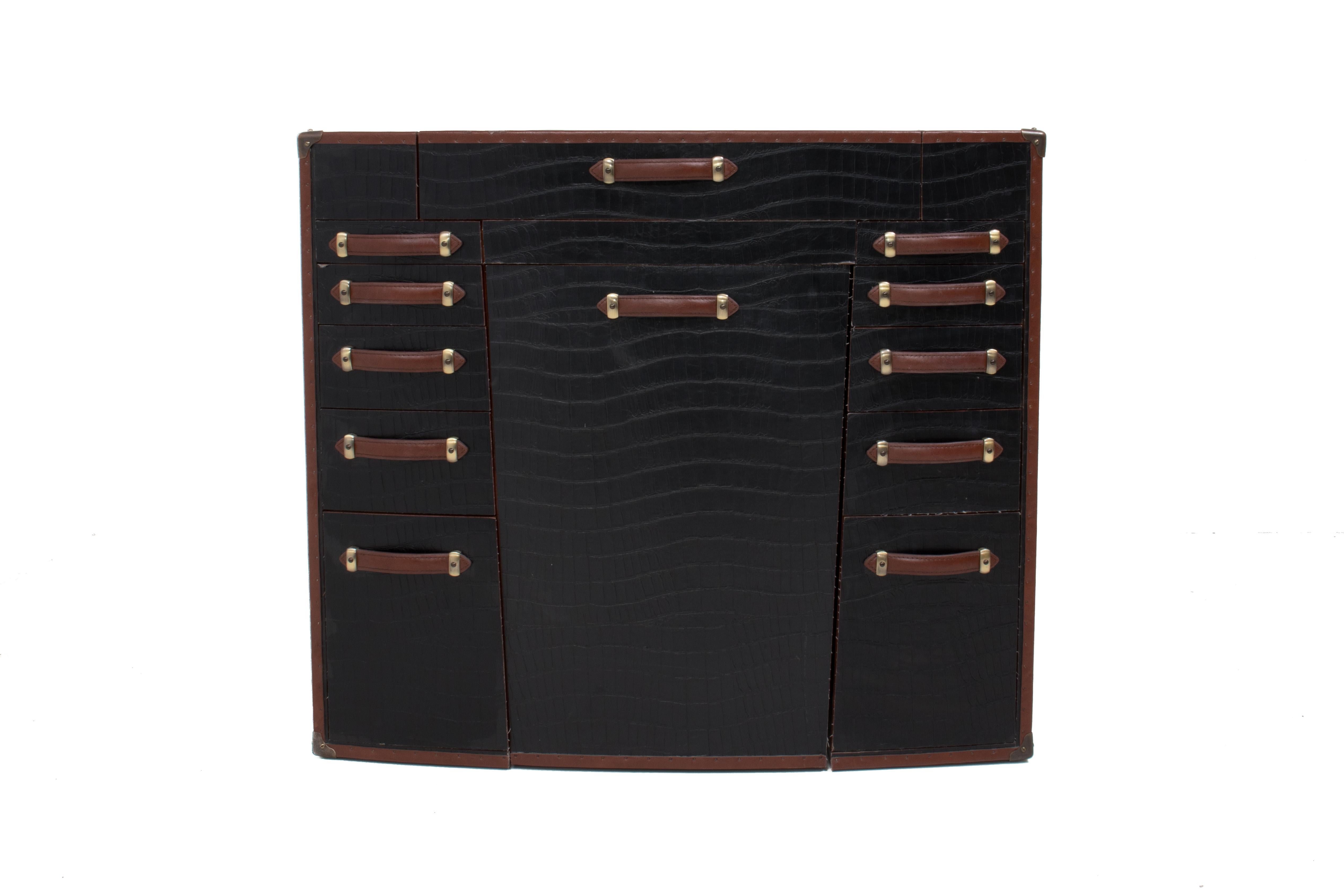 This dressing table has everything you need at hand. Plenty of storage and a rolling chair with a fold-away drawer on each side. Open the inside top and it reveals a triptych mirror. 

This Starbay La Desirade dresser has a luxurious rosewood