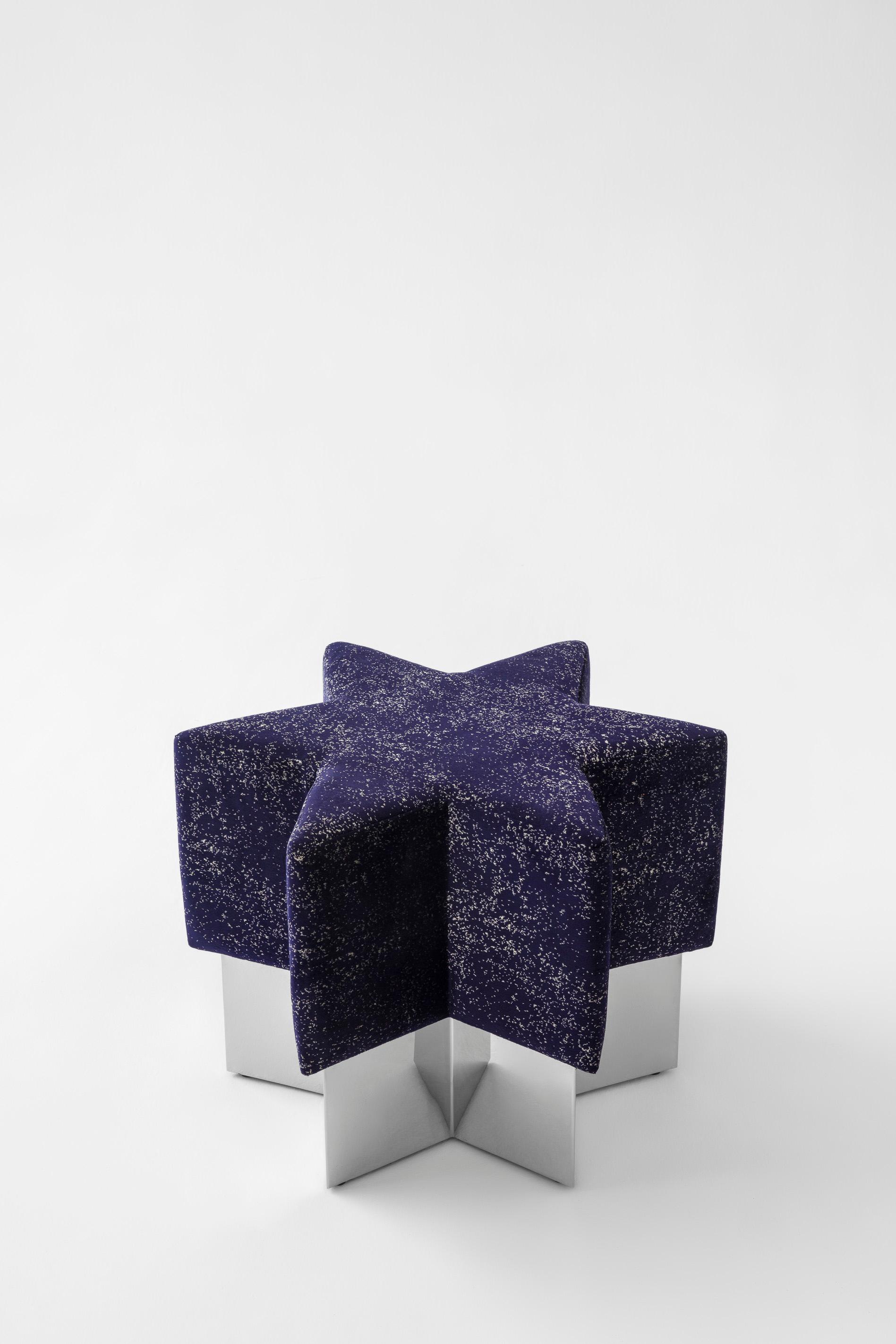 “Starboy Pouf” is inspired by the celestial sphere. It is a metaphorical object from the skies which has been projected to the observer on earth. The glittery velvet and high polished chrome base of 