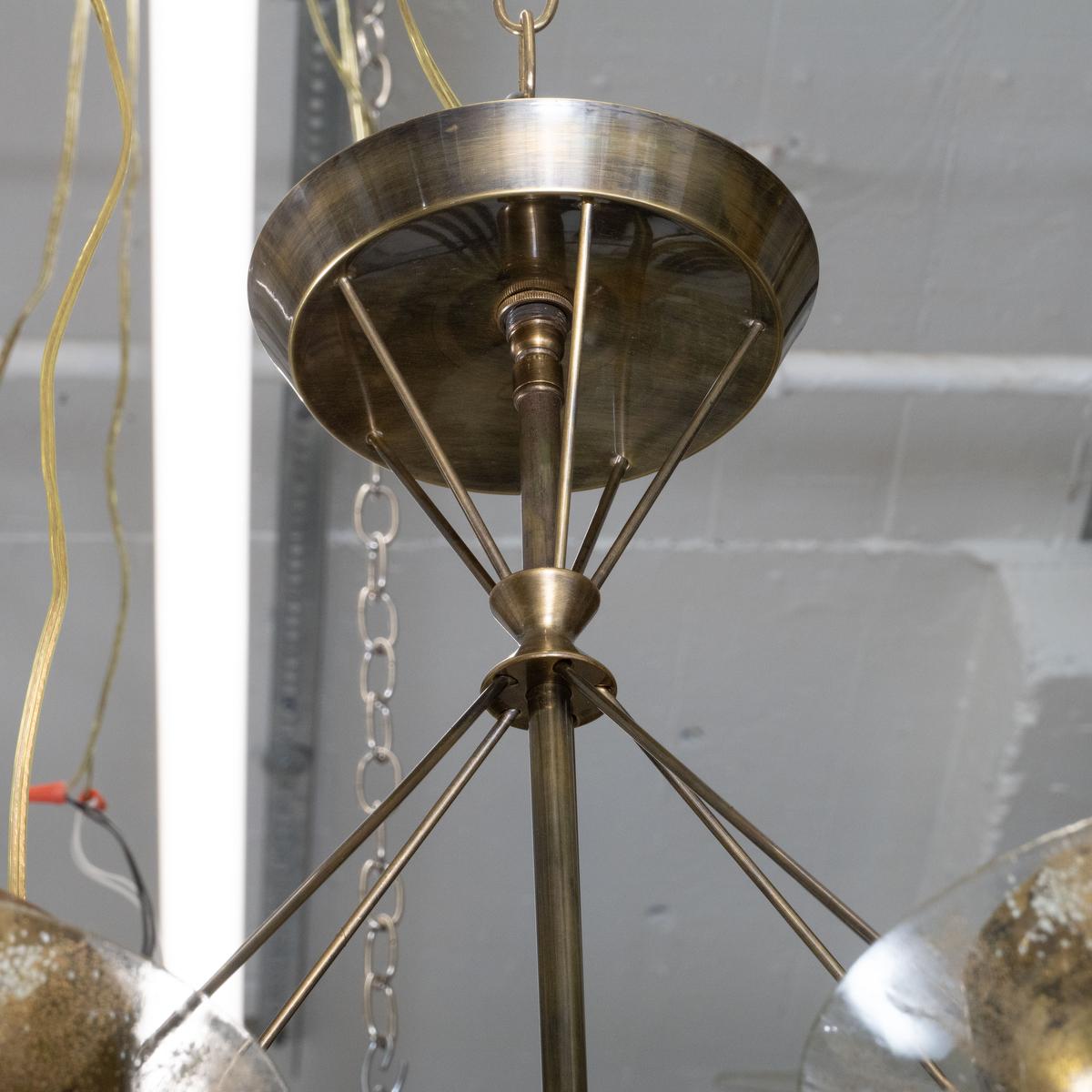 Brass Starburst chandelier by Gerald Thurston for Lightolier For Sale