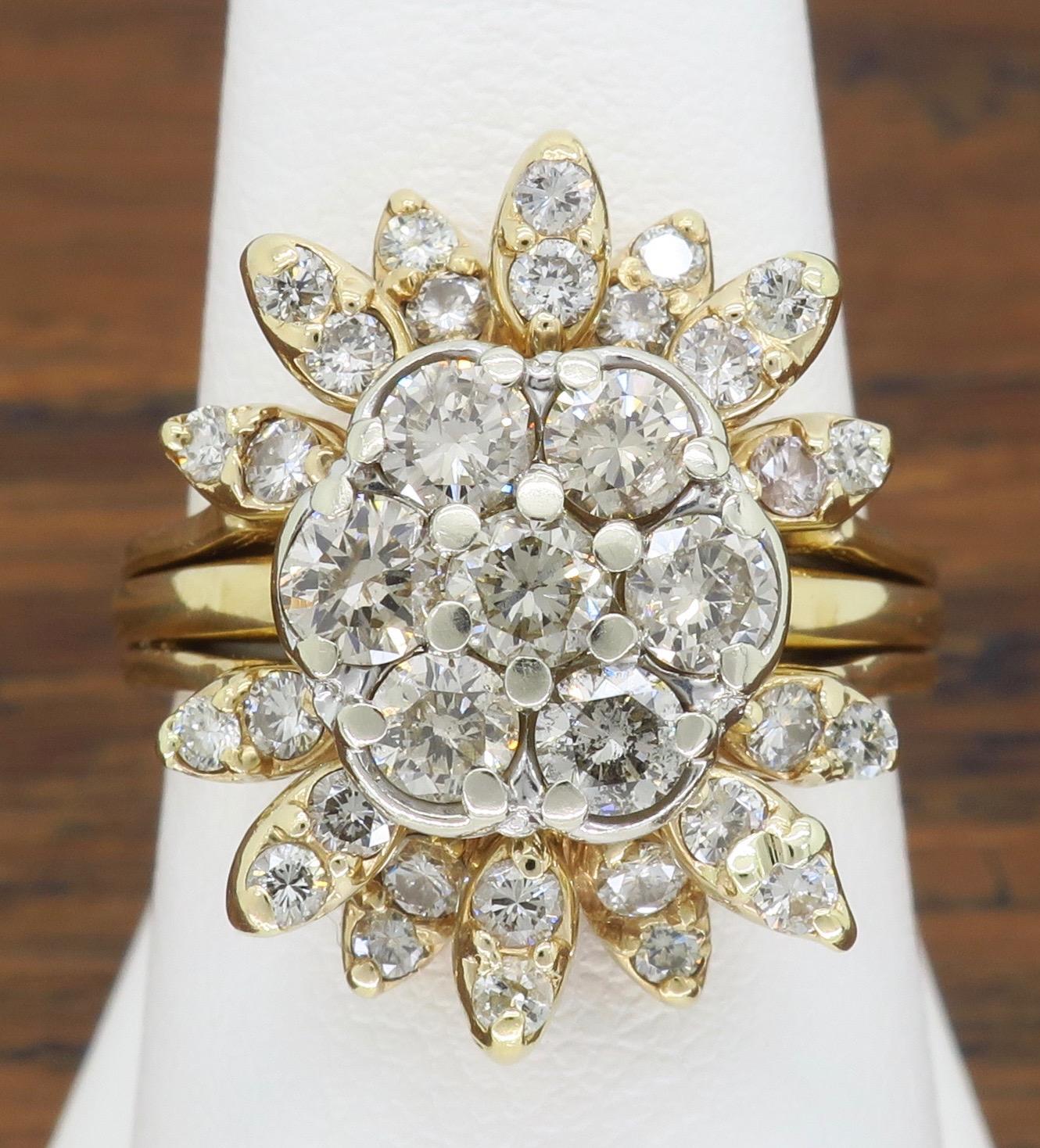This beautiful 14k gold vintage diamond ring features 1.50CTW of diamonds set in a floral design.

Diamond Cut: 35 Round Brilliant Cut
Average Diamond Color: G-K
Average Diamond Clarity:  SI1-I1
Diamond Carat Weight:  Approximately 1.50CTW
Metal: