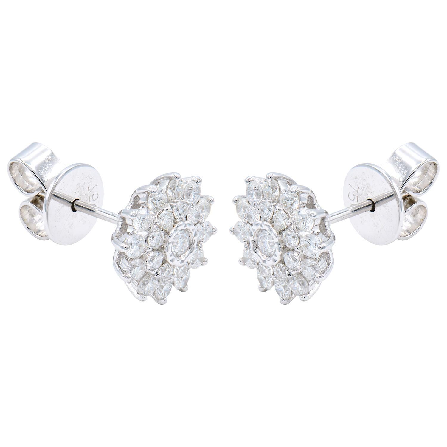 These beautiful diamond earrings are definitely for someone special. They are made out of 2.6 grams of 18 karat white gold which is set with 44 round VS2, G color diamonds totaling 0.66 carats to complete this stunning shape. The earrings are