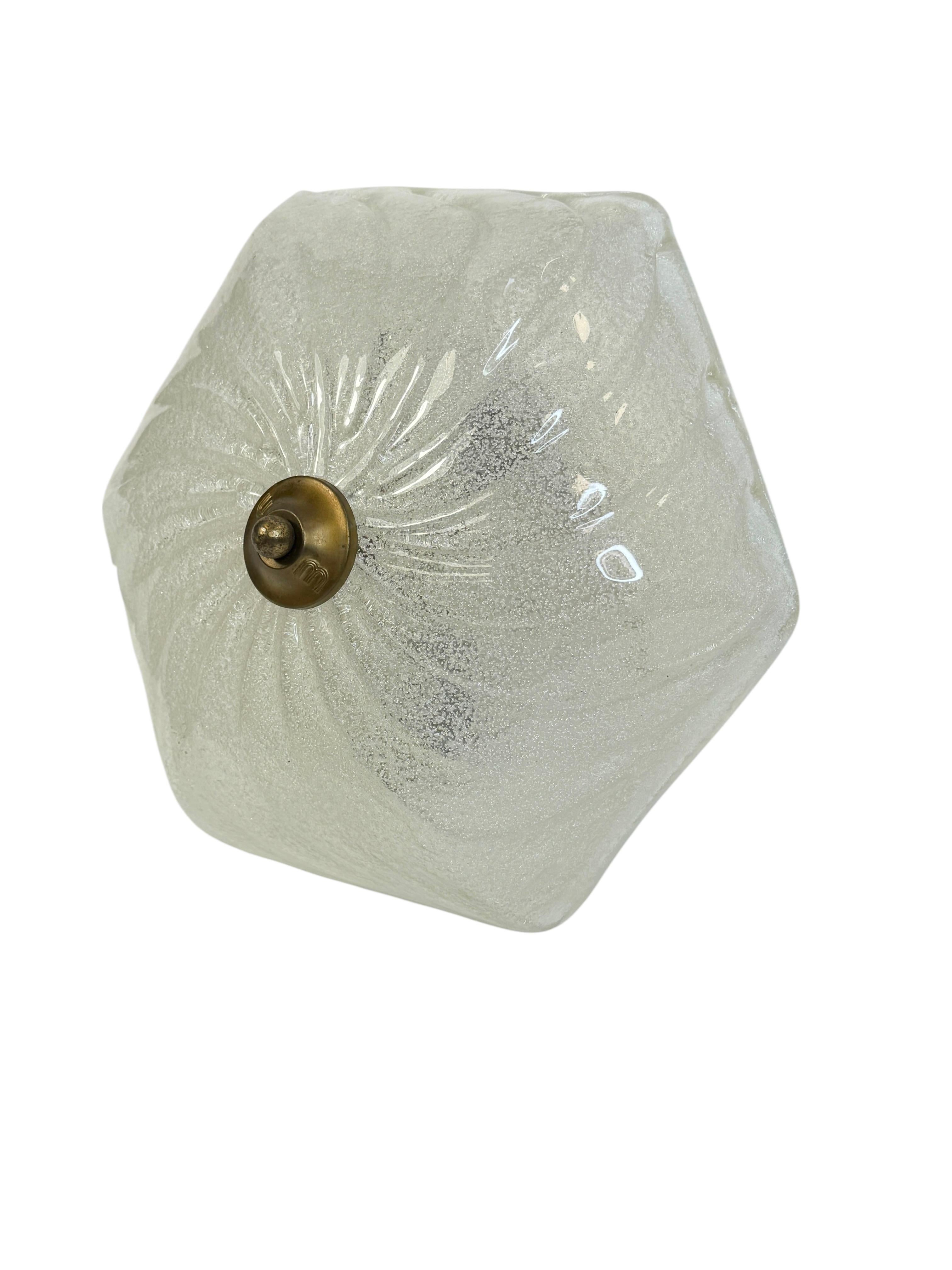 A beautiful ice glass flush mount. Made in Germany in the 1970s. Gorgeous textured glass flush mount with metal fixture. Made by Briloner Lighting company in Germany, a well known manufactory of decorative lights. The Fixture requires two European