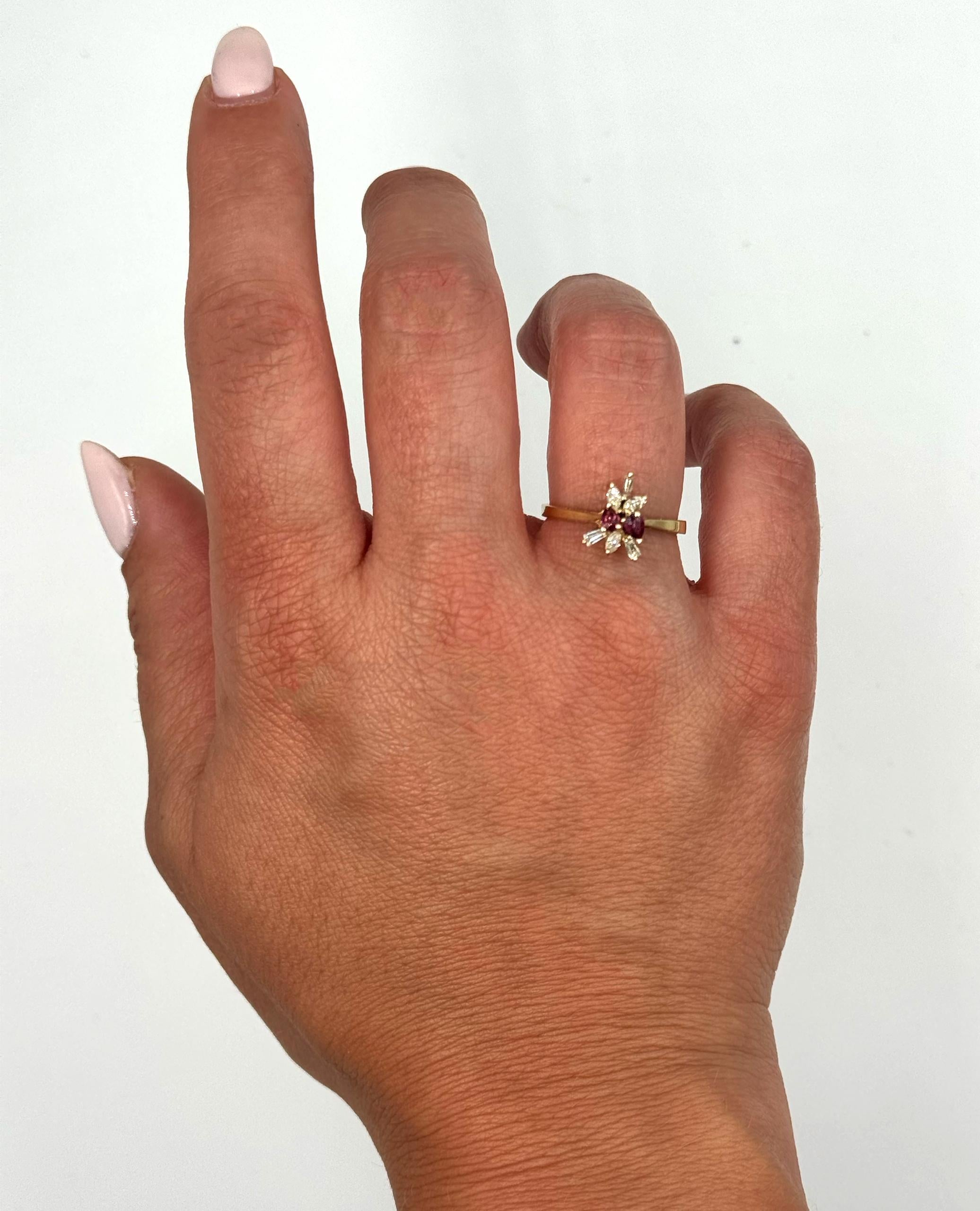 Women's Starburst Pear Shape Ruby Ring in Tapering 14K Yellow Gold Setting with Diamonds For Sale