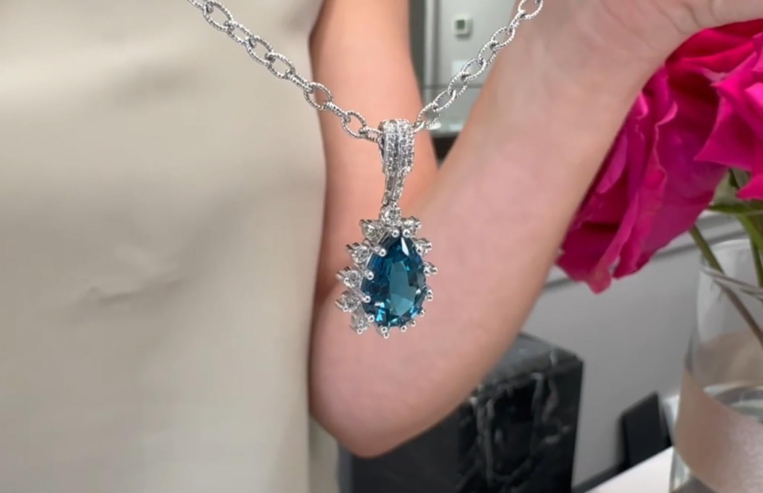 Starburst Pendant Necklace with Pear Shaped London Blue Topaz and Diamonds For Sale 1