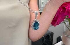 Starburst Pendant Necklace with Pear Shaped 5.18 Ct London Blue Topaz & Diamonds