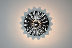 Starburst Sconce in Stainless with Half Dipped Bulb by Christopher Kreiling