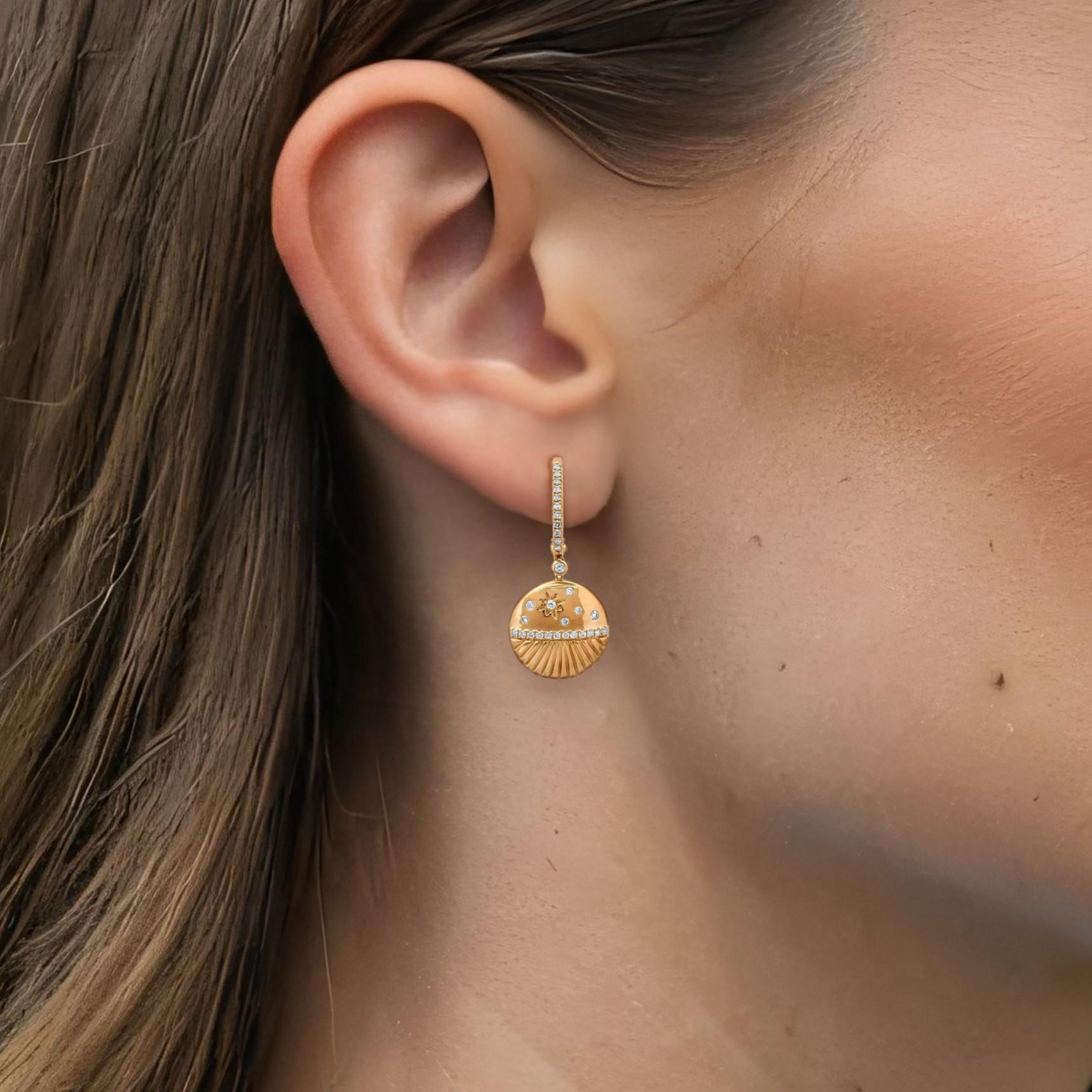 Enhance your elegance with the luxurious Starburst Shell 14K Yellow Gold Drop Earrings. Featuring radiant diamonds set in a sleek design, these earrings capture the perfect balance of sparkle and sophistication. Crafted to add a velvet-like shine,