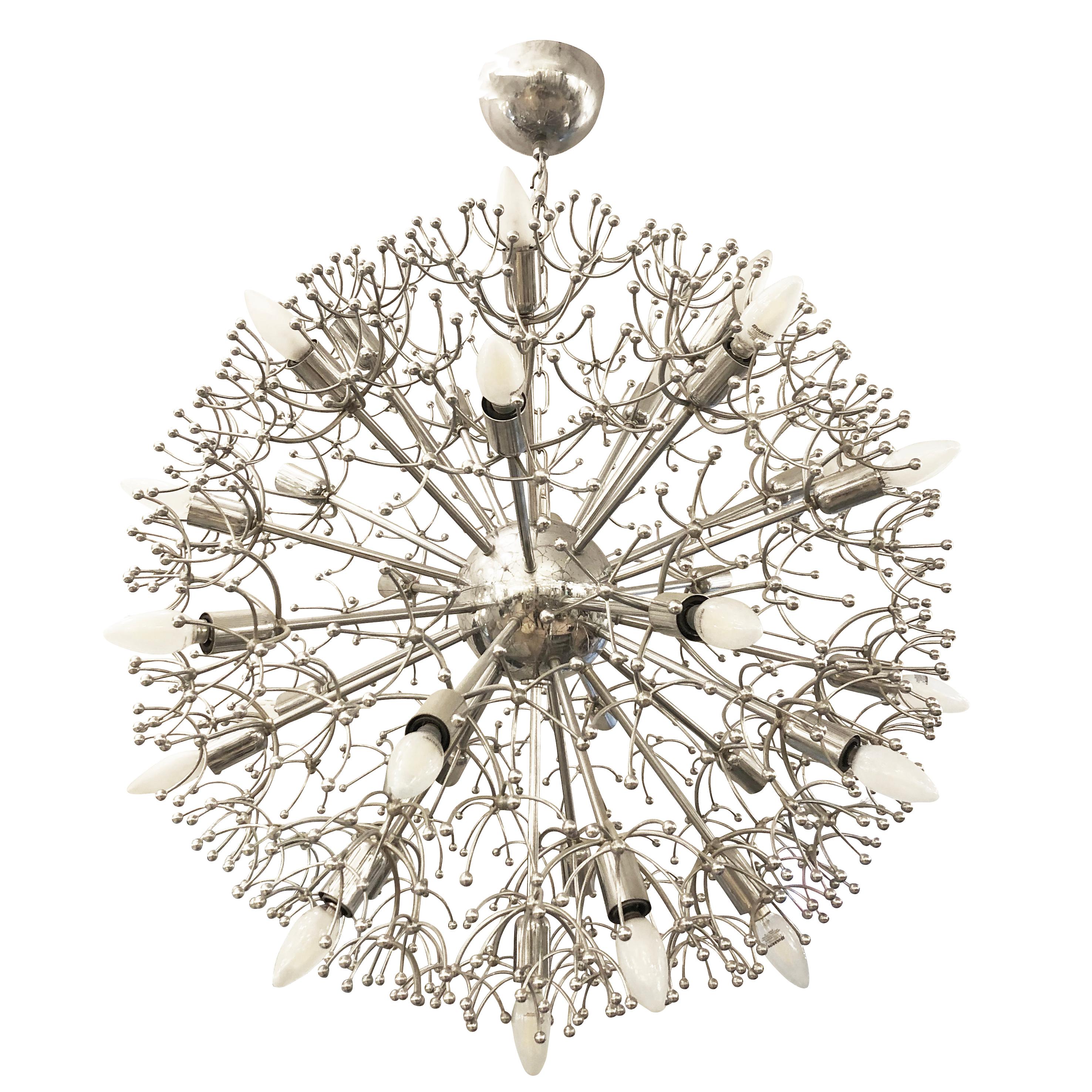Chrome starburst Sputnik chandelier by Sciolari with 20 lights. Length of chain can be adjusted as needed.

Condition: Good vintage condition, minor wear consistent with age and use. Requires rewiring 

Measures: Diameter 30”

Height 38”.

  