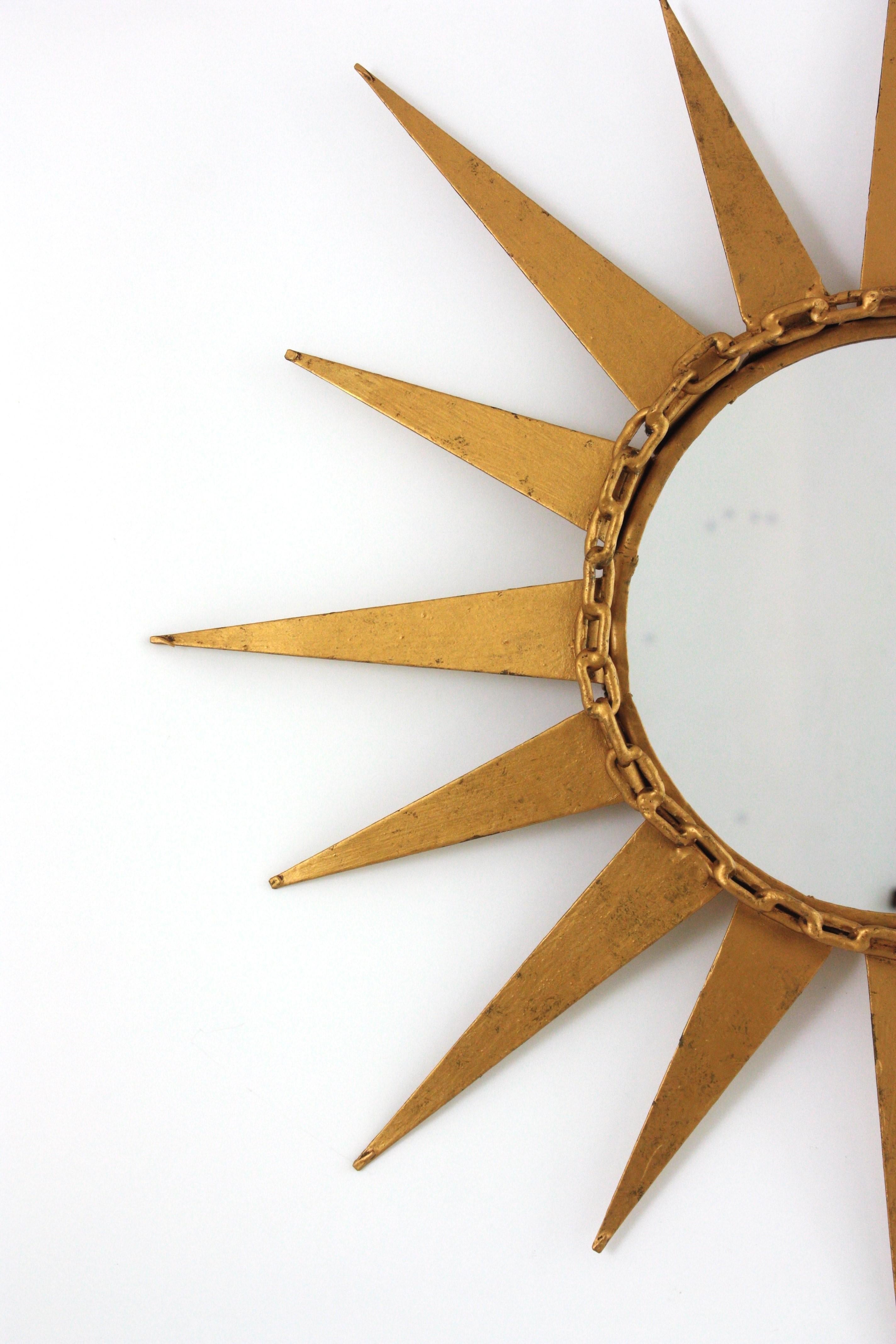Metal Starburst Sunburst Mirror in Gilt Iron with Chain Link Motif, Spain 1950s For Sale