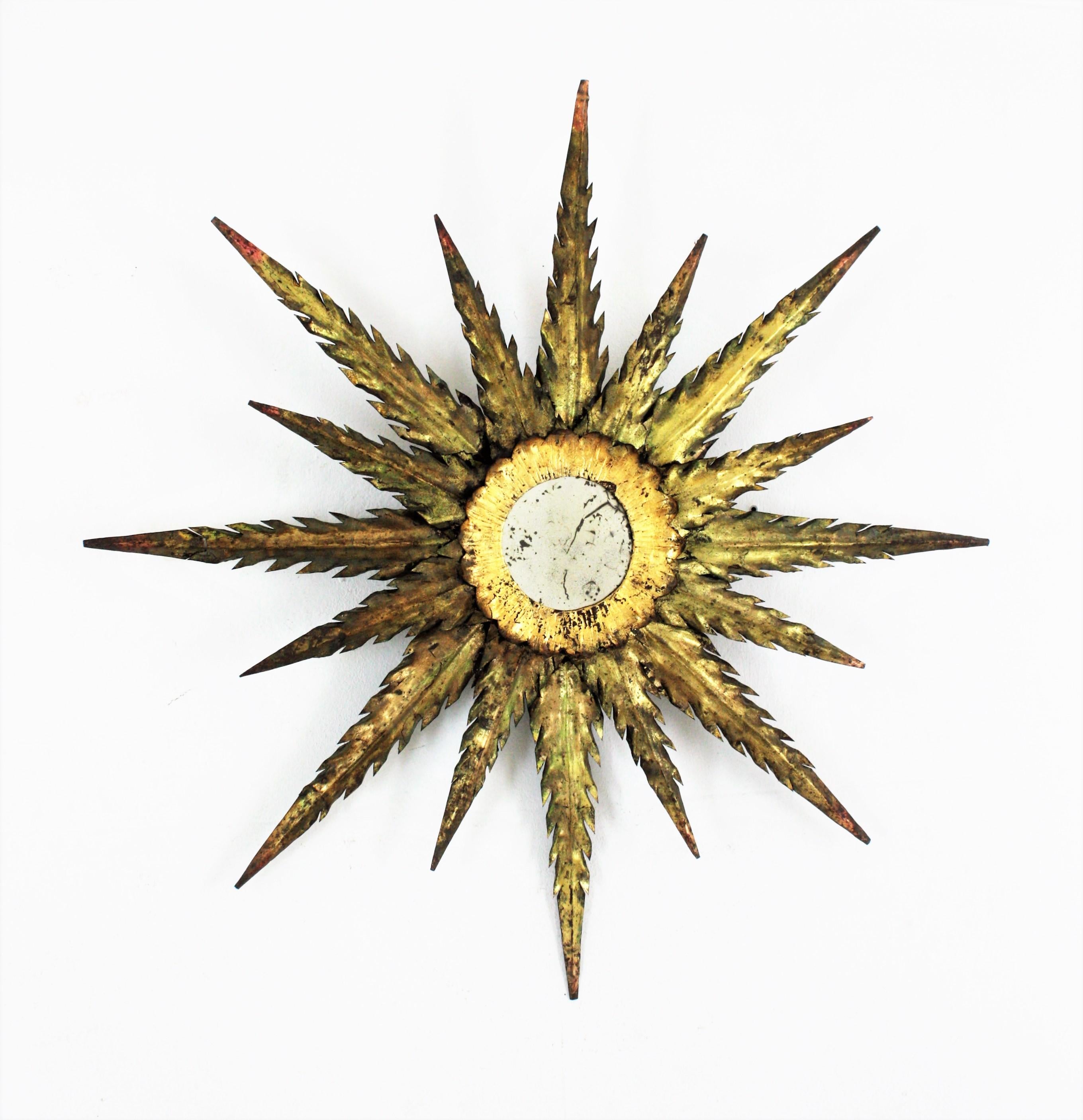 Brutalist Starburst Sunburst Wall Mirror / Light Fixture in Gilt Metal For Sale