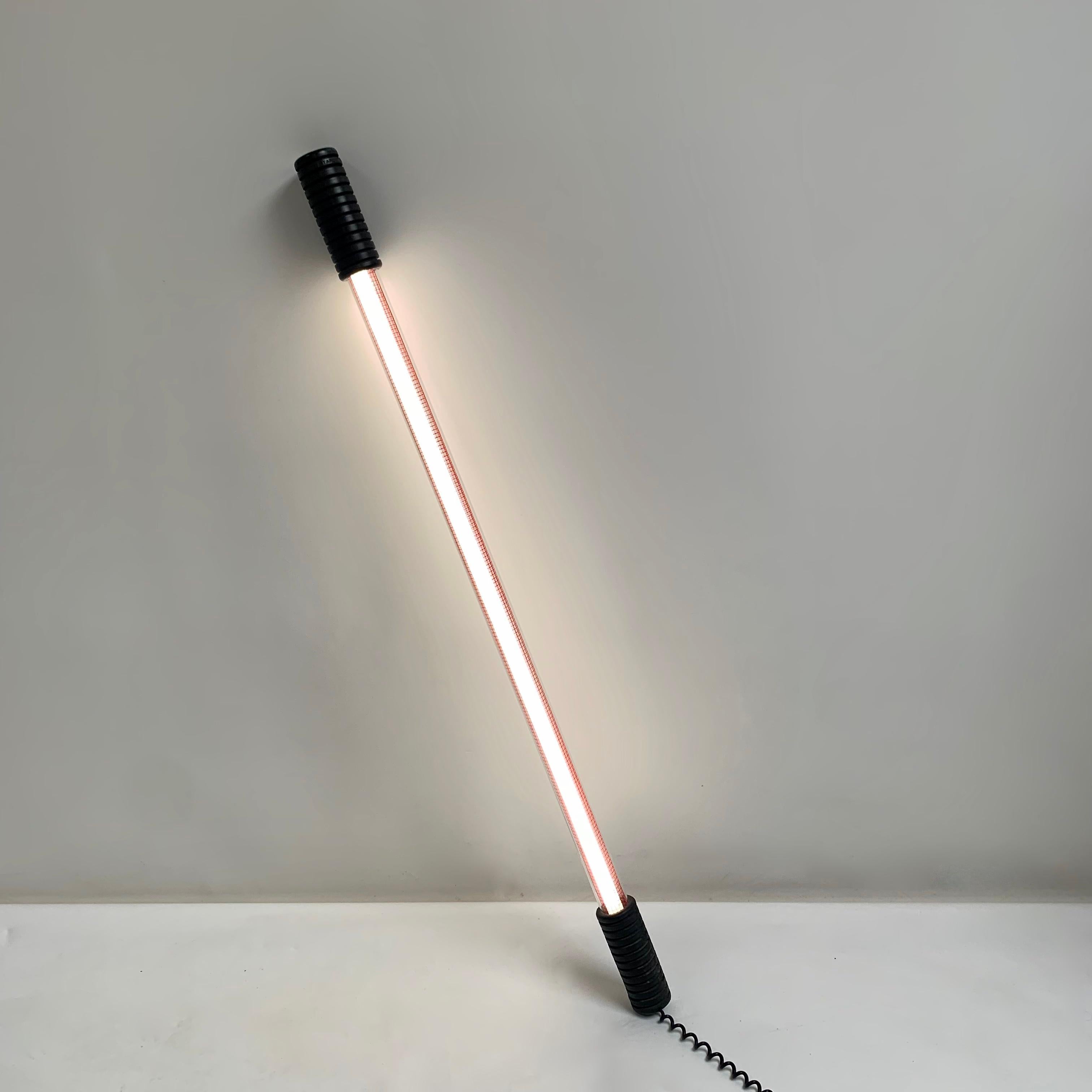 Rare Philippe Starck Easylight model floor lamp for Electrorama, circa 1980, France.
Stamped Starck product. First edition.
The lamp lights on and off by tilting it, using mercury switch.
Fluorescent tube, polyurethane , polycarbonat tube,