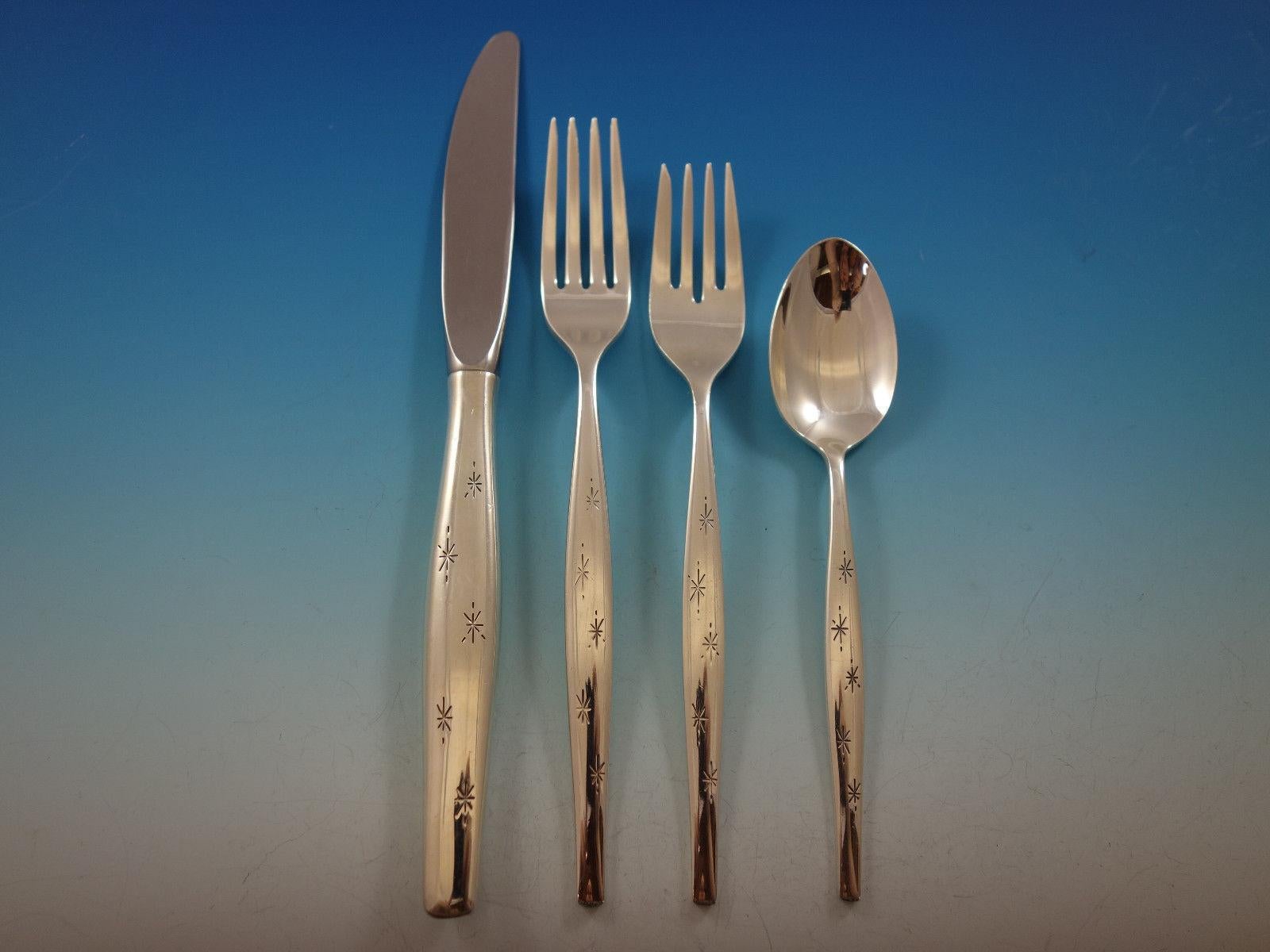 Mid-Century Modern Stardust by Gorham circa 1957 sterling silver Flatware set, 54 pieces. This set includes:

8 Knives, 9
