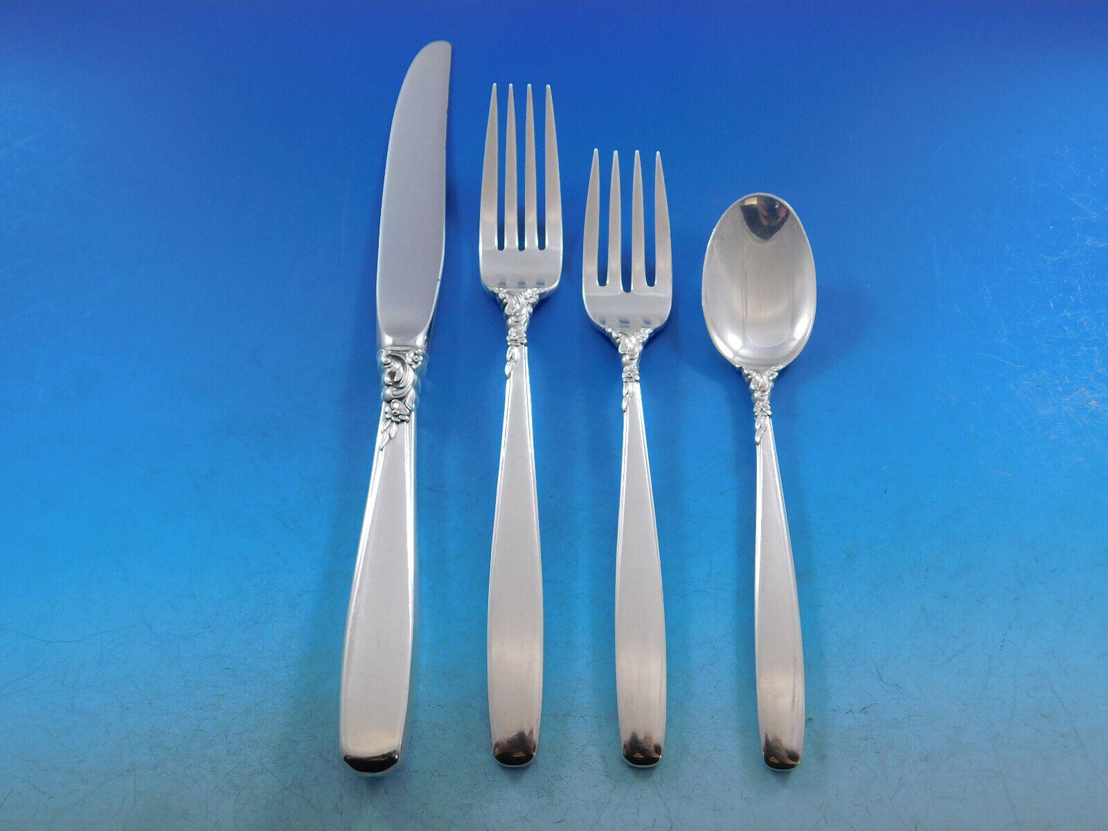 Starfire by Lunt Sterling Silver Flatware set, 44 pieces. This set includes:

8 Knives, 9 1/8