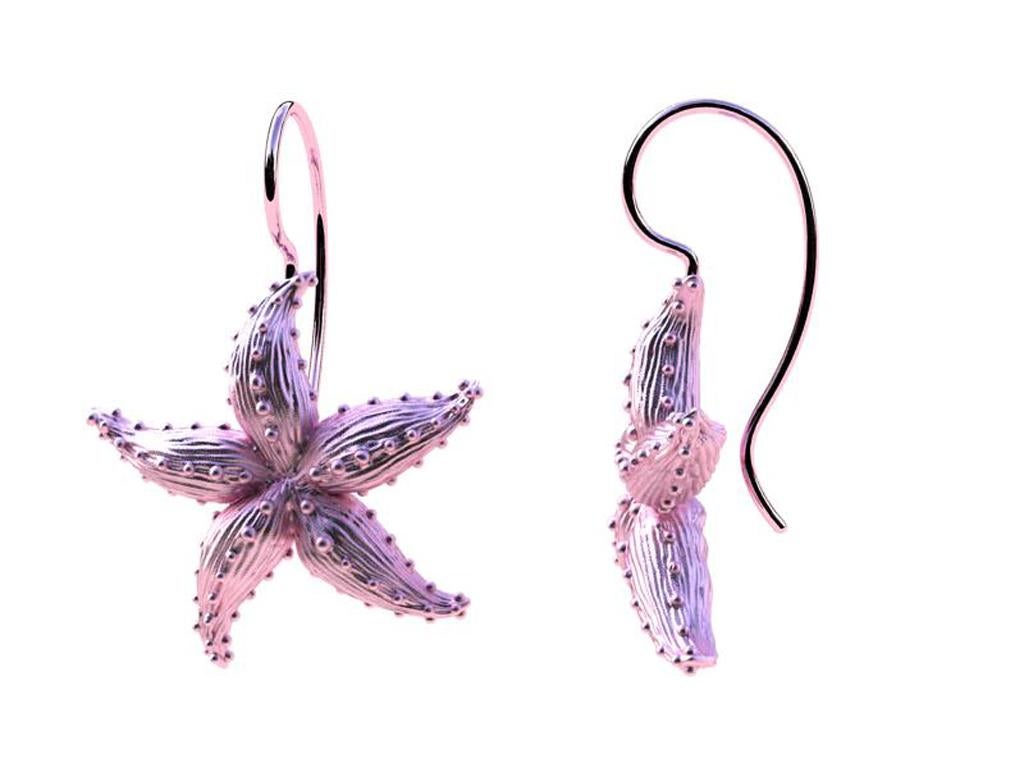 Starfish  10kp Gold  Earrings, The Ocean series.  Summer or winter depending where you live, for the beach lovers. Inspired from sea creatures, with their great shapes and colors. Matte finished. 
These stars are 25 mm tall plus the hook.  These are