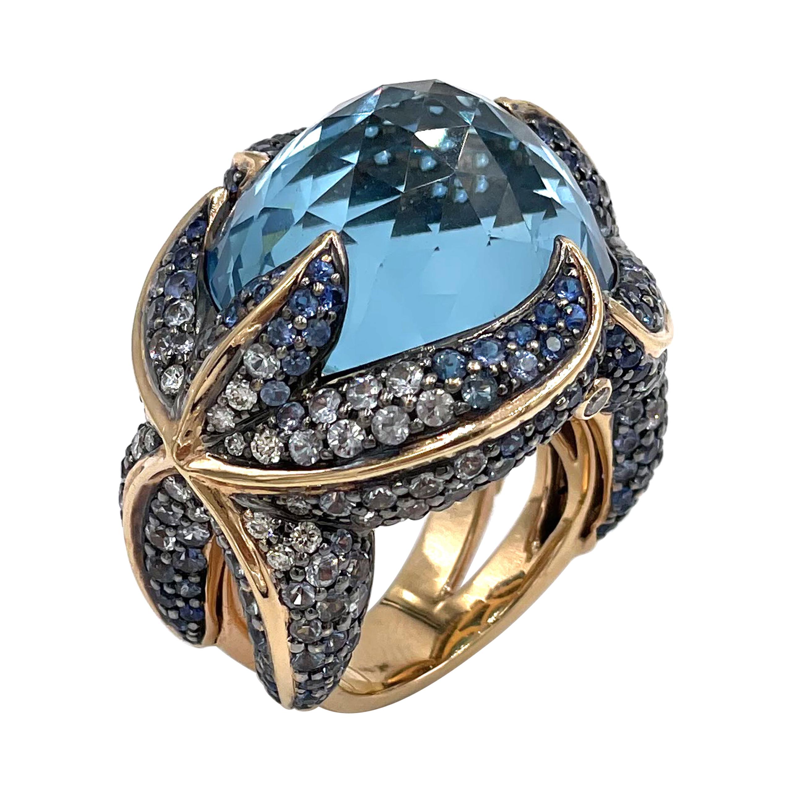 "Starfish" 18k Rose Gold and Blue Topaz Ring