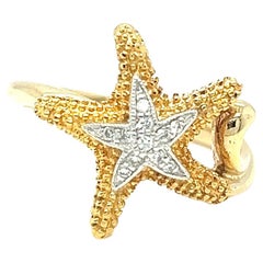Anello con diamante ispirato alla stella marina in oro giallo 14k