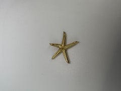 Starfish pendant necklace 18Kt yellow gold
