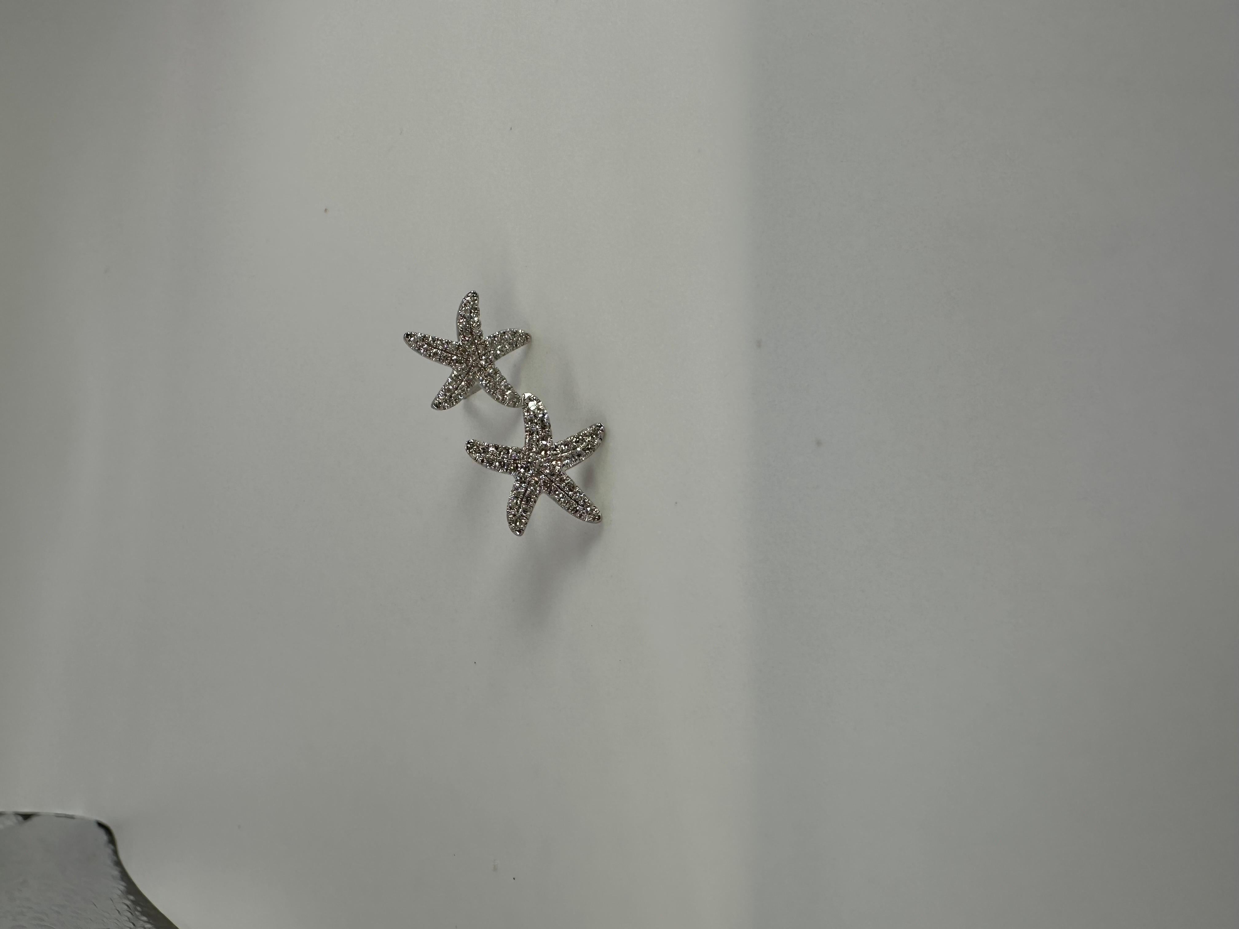 Pretty starfish studs with diamonds in 14KT white gold.

GOLD: 14KT gold
NATURAL DIAMOND(S)
Clarity/Color: SI/G-H
Carat:0.33ct
Grams:2.30
Item#: 150-00154 PFT

WHAT YOU GET AT STAMPAR JEWELERS:
Stampar Jewelers, located in the heart of Jupiter,