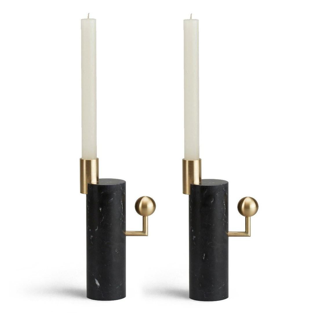 A beautiful union of brass and marble, the ‘Stargazer’ candleholders are inspired by orreries - mechanical models of the solar system used since classical times. Available in two designs, these candlesticks have a powerful sculptural presence far