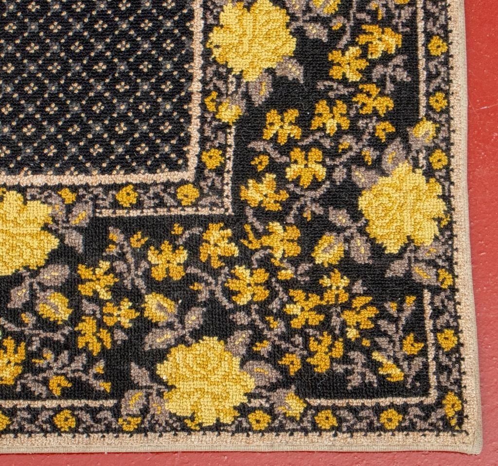 Stark Modern rug with floral border. 

Dealer: S138XX