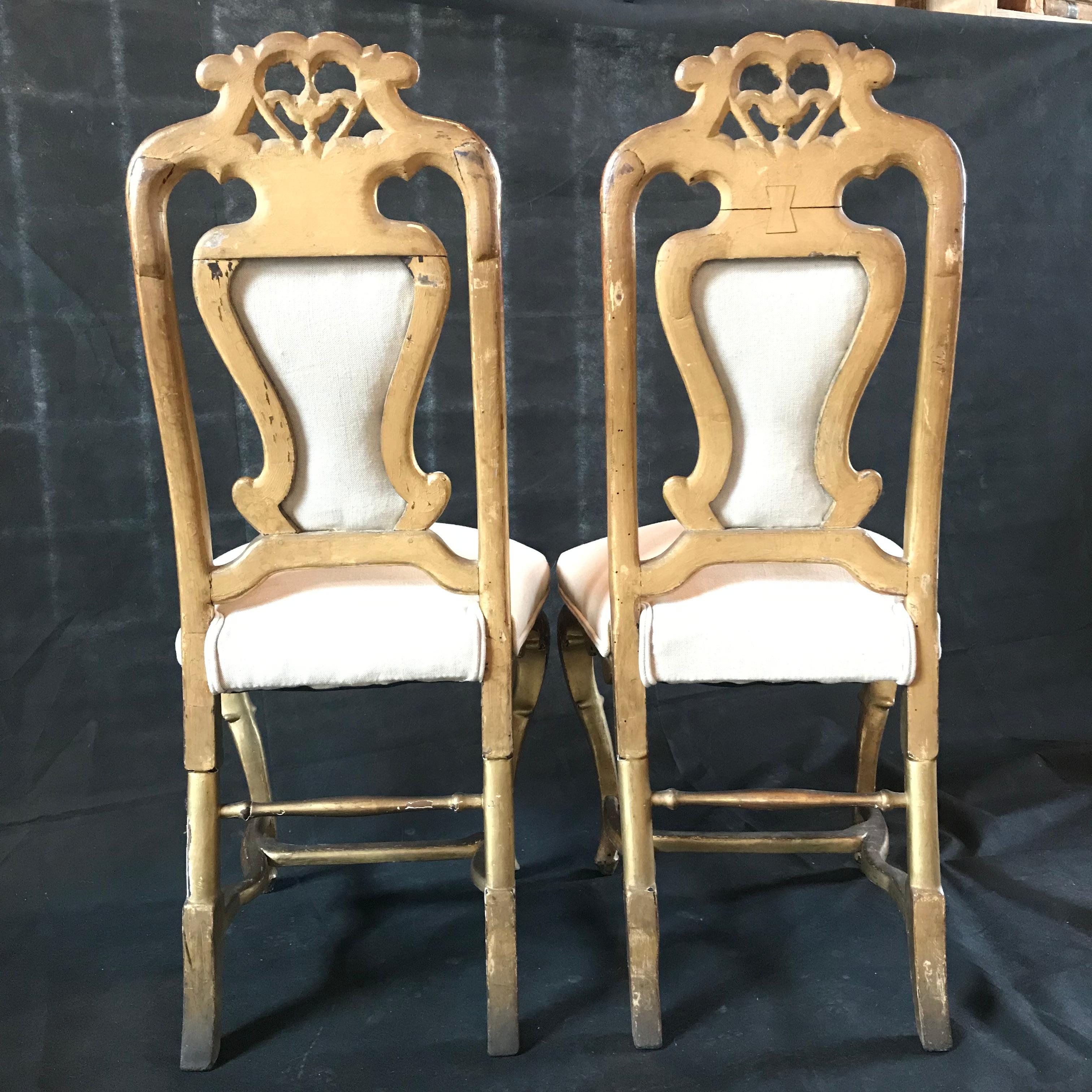 
Lovely pair of French chairs bought in the south of France with really stunning original gold gilt paint from the 19th century. Chairs are newly reupholstered with a neutral high quality linen cotton blend. 
#5229
 H to seat 23.5