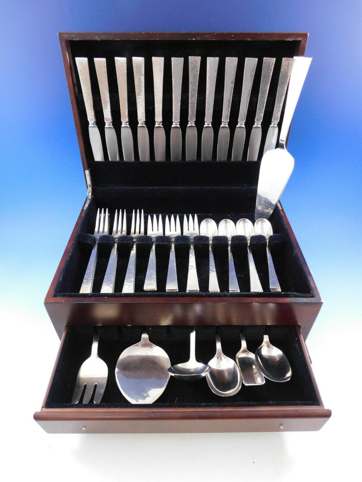 Starlit BY Allan Adler handwrought sterling silver flatware set with hand-hammered finish, 55 pieces. This set includes:

12 dinner knives, solid handles, 9 3/8