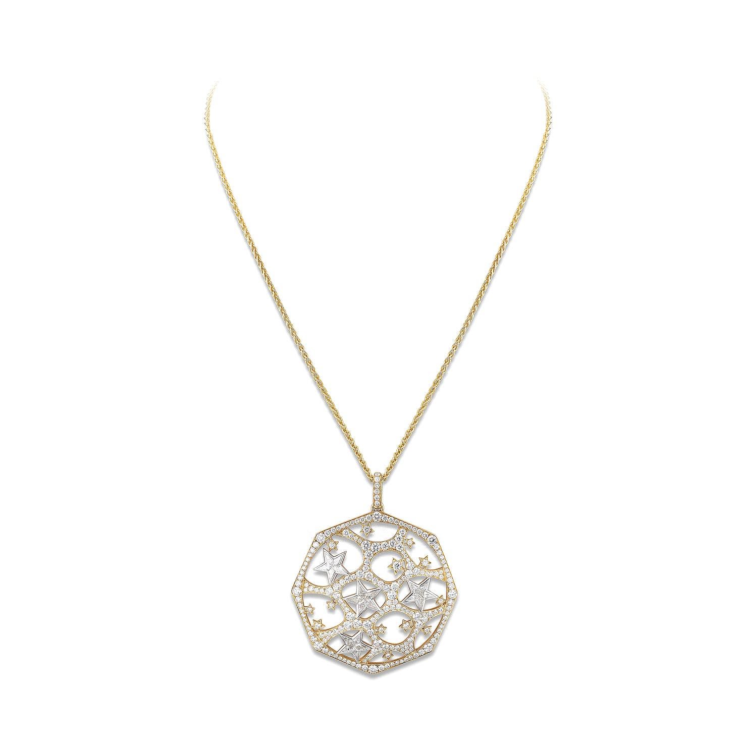 Pendente a forma di stella in oro giallo e bianco 18 carati con 198 diamanti da 9,34 carati e 20 stelle di diamanti da 2,79 carati      
