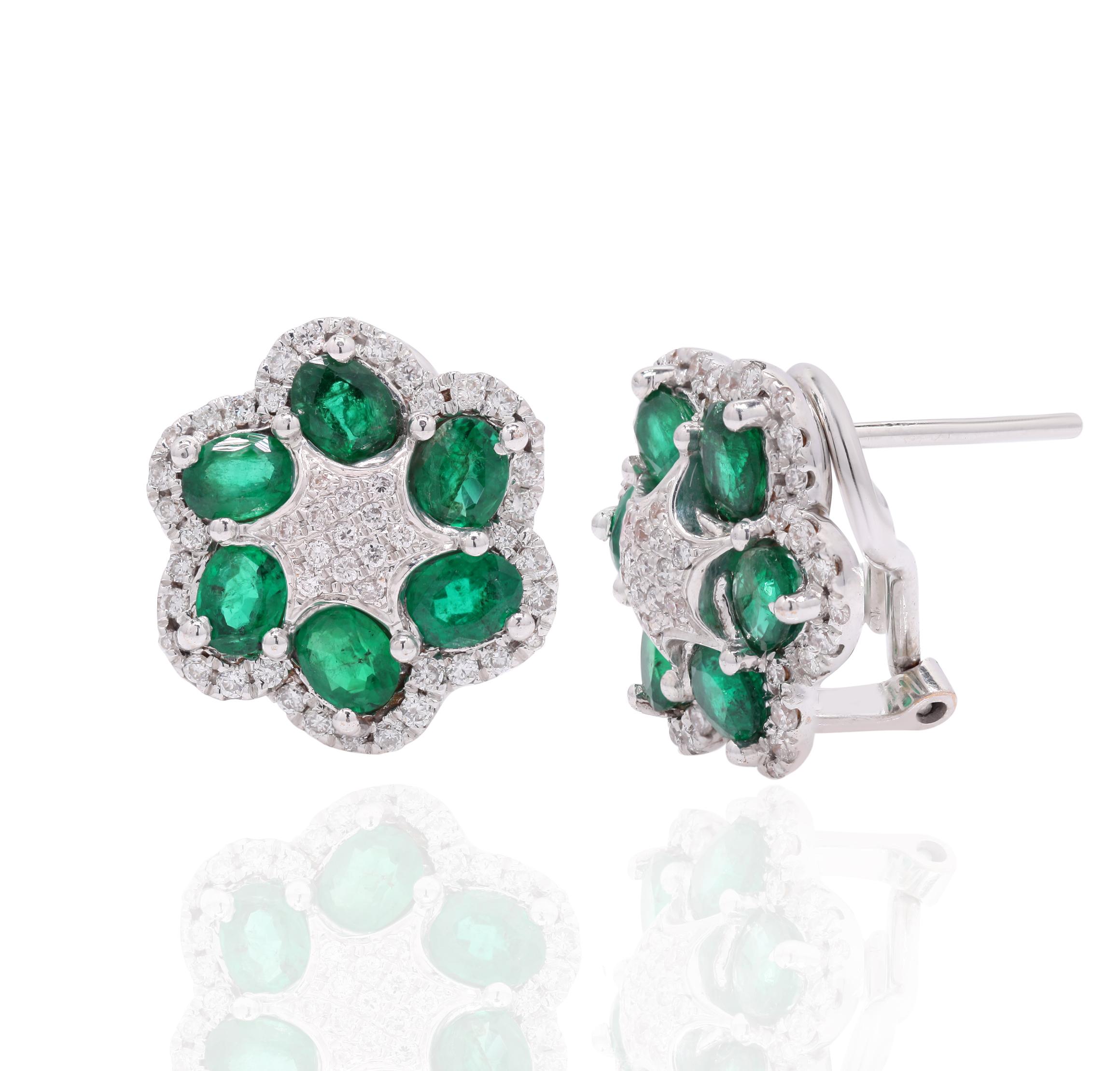 Earrings create a subtle beauty while showcasing the colors of the natural precious gemstones and illuminating diamonds making a statement.
Oval cut Emerald and Diamond Clip On Stud earrings in 14K gold. Embrace your look with these stunning pair of