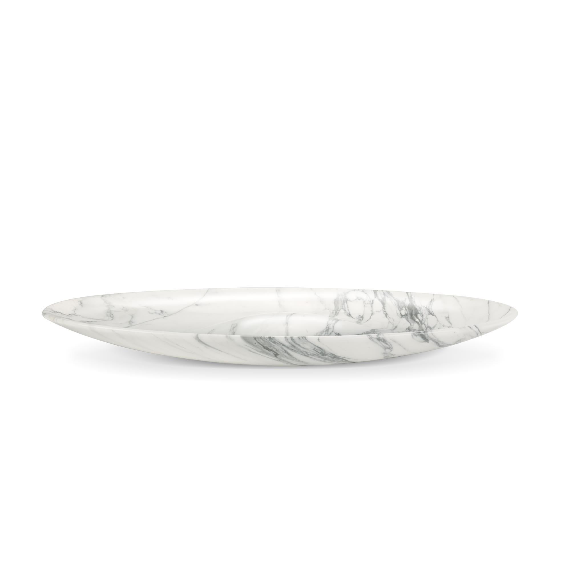 Important sculptural bowl hand-carved from a solid block of Statuary Marble. The Statuary marble is one of the most valuable and appreciated types of marble in the world, it is extracted in the Italian quarries located in Tuscany and its pure white