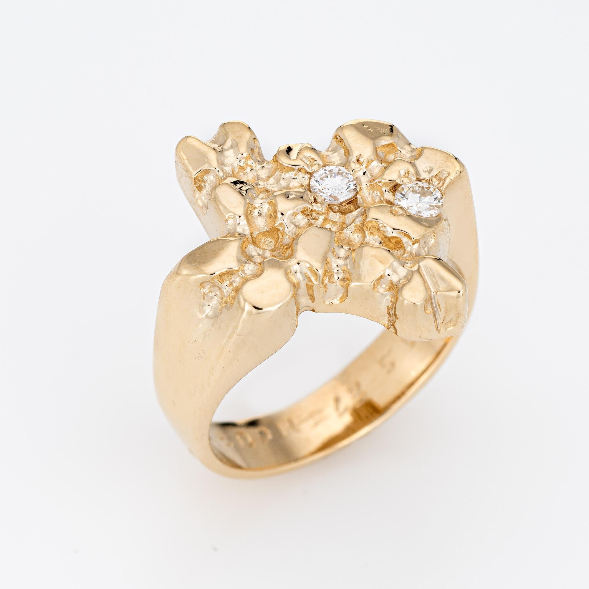 Stylish vintage State of Texas diamond nugget ring (circa 1987) crafted in 14 karat yellow gold. 

One estimated 0.10 and one estimated 0.18 carat diamond are set into the mount. The total diamond weight is estimated at 0.28 carats (estimated at G-H