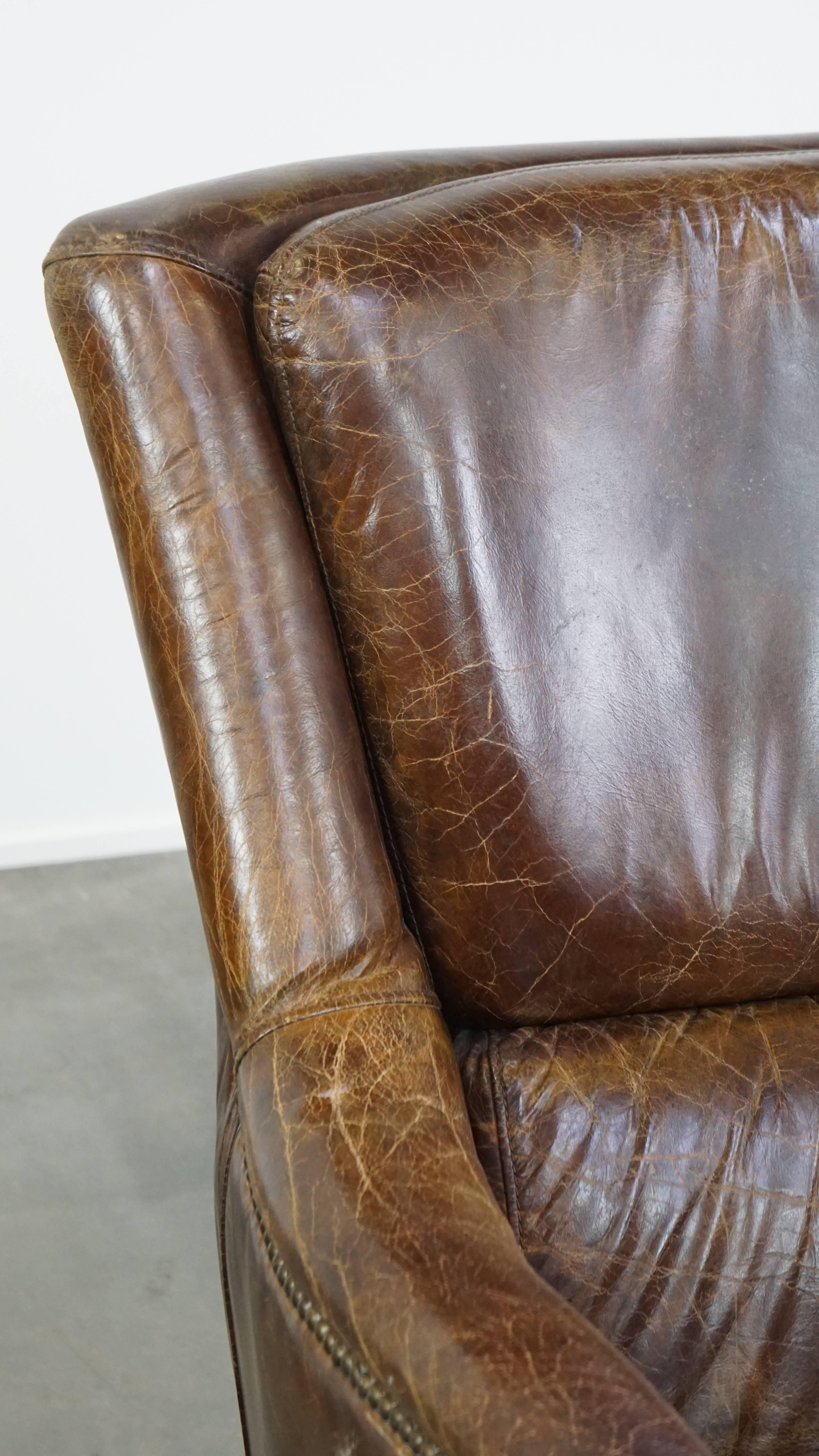Stately and comfortable grained cowhide armchair with a timeless design For Sale 4