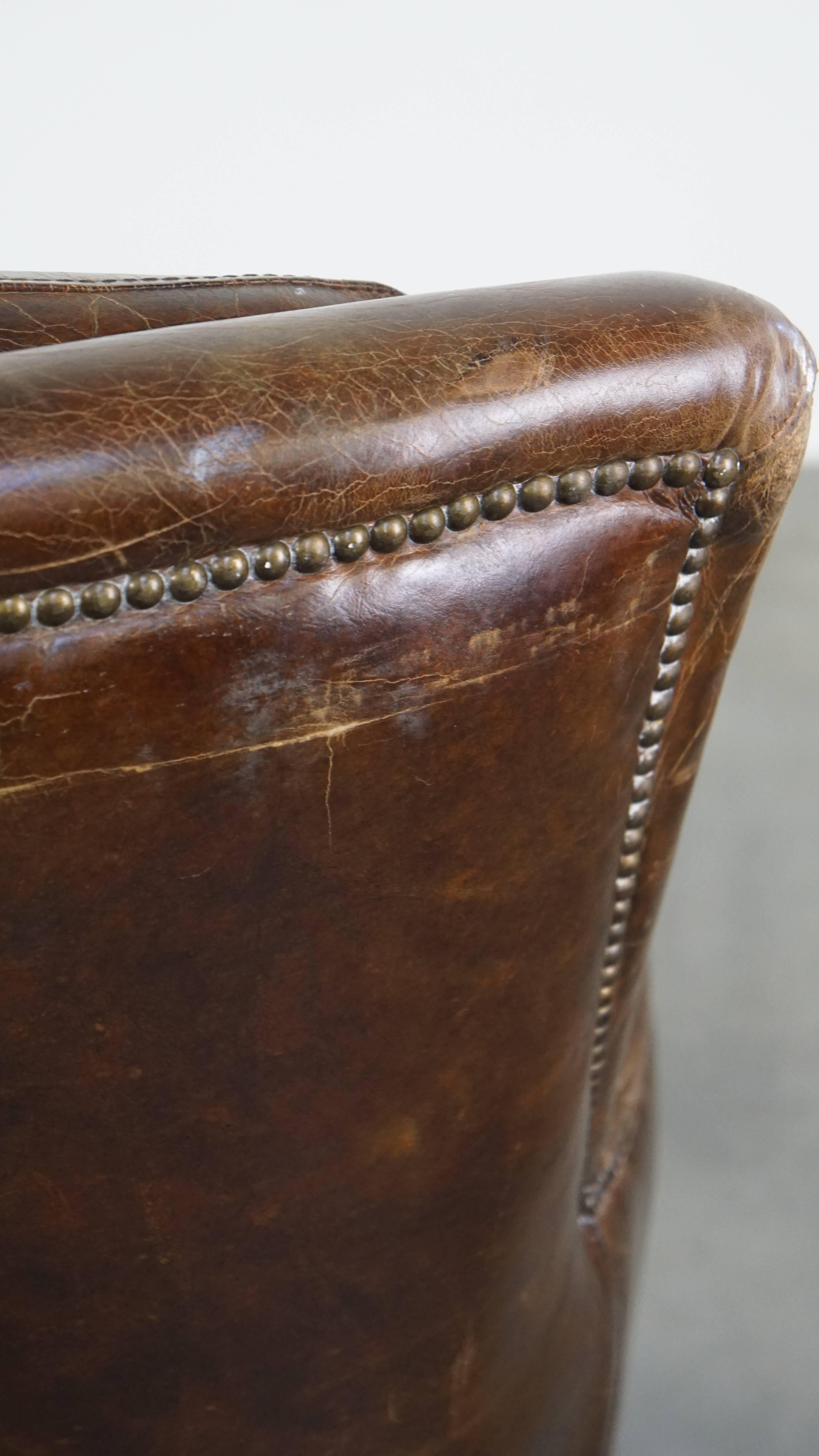 Stately and comfortable grained cowhide armchair with a timeless design For Sale 7