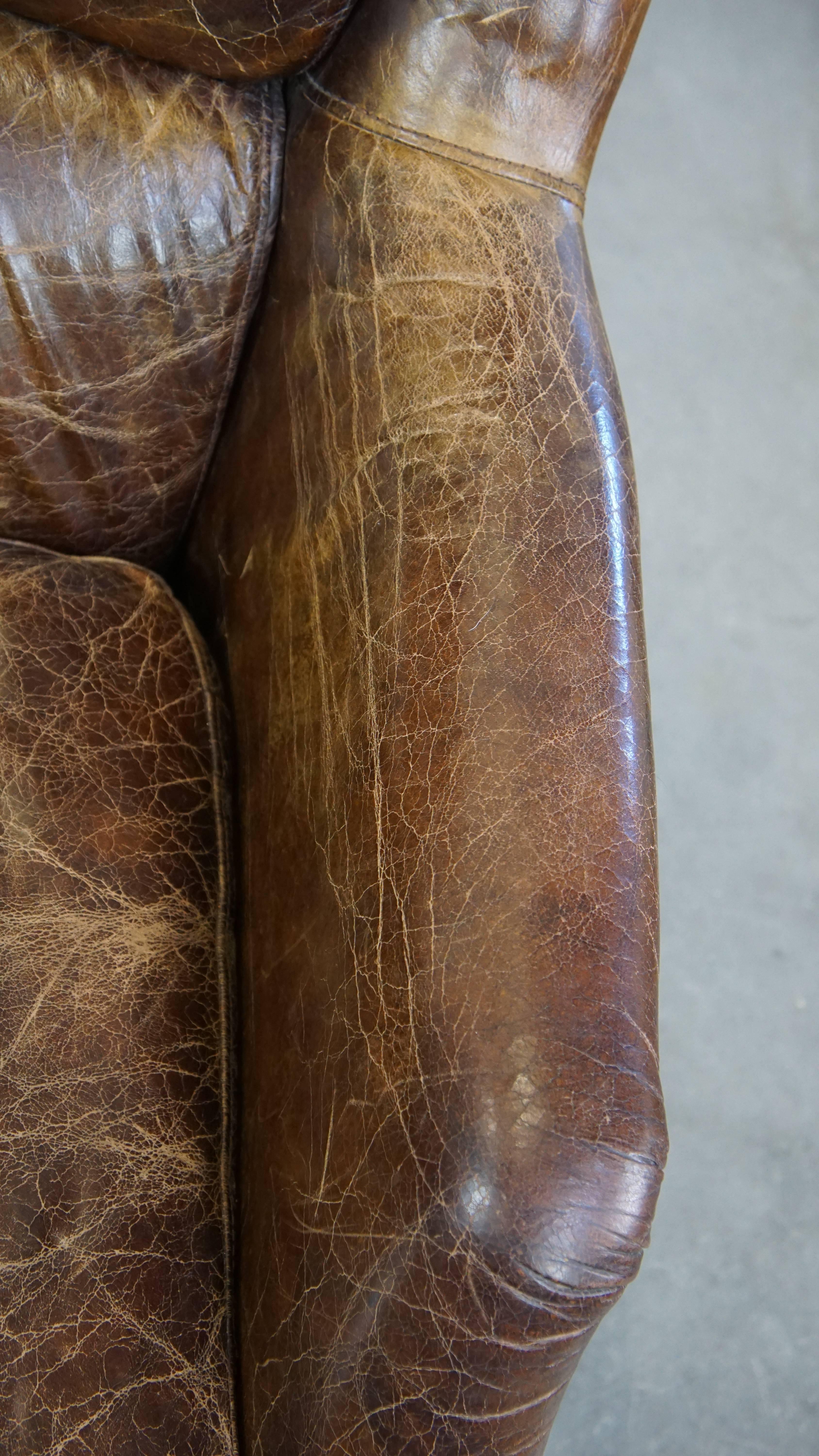 Stately and comfortable grained cowhide armchair with a timeless design For Sale 2