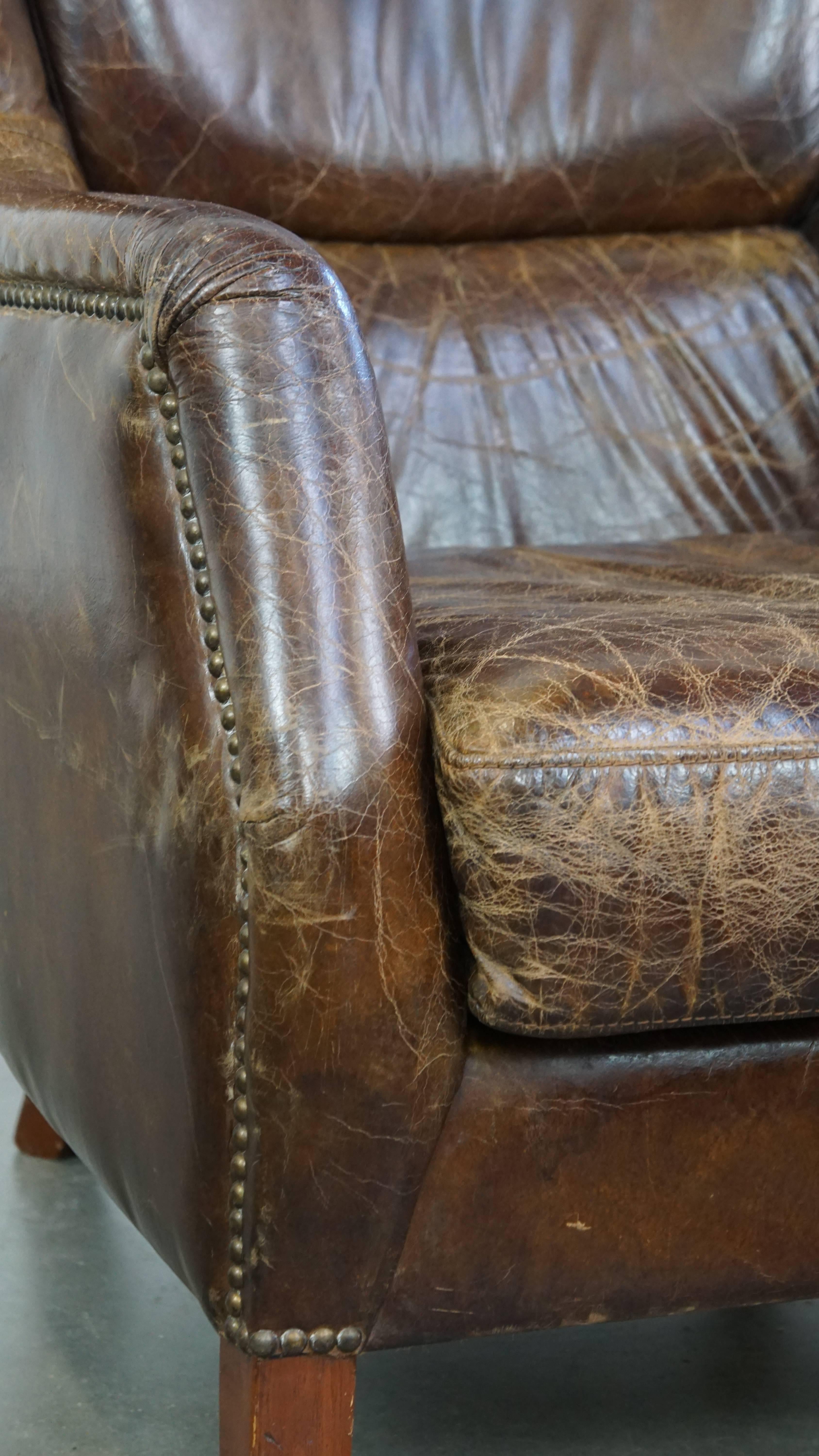 Stately and comfortable grained cowhide armchair with a timeless design For Sale 3