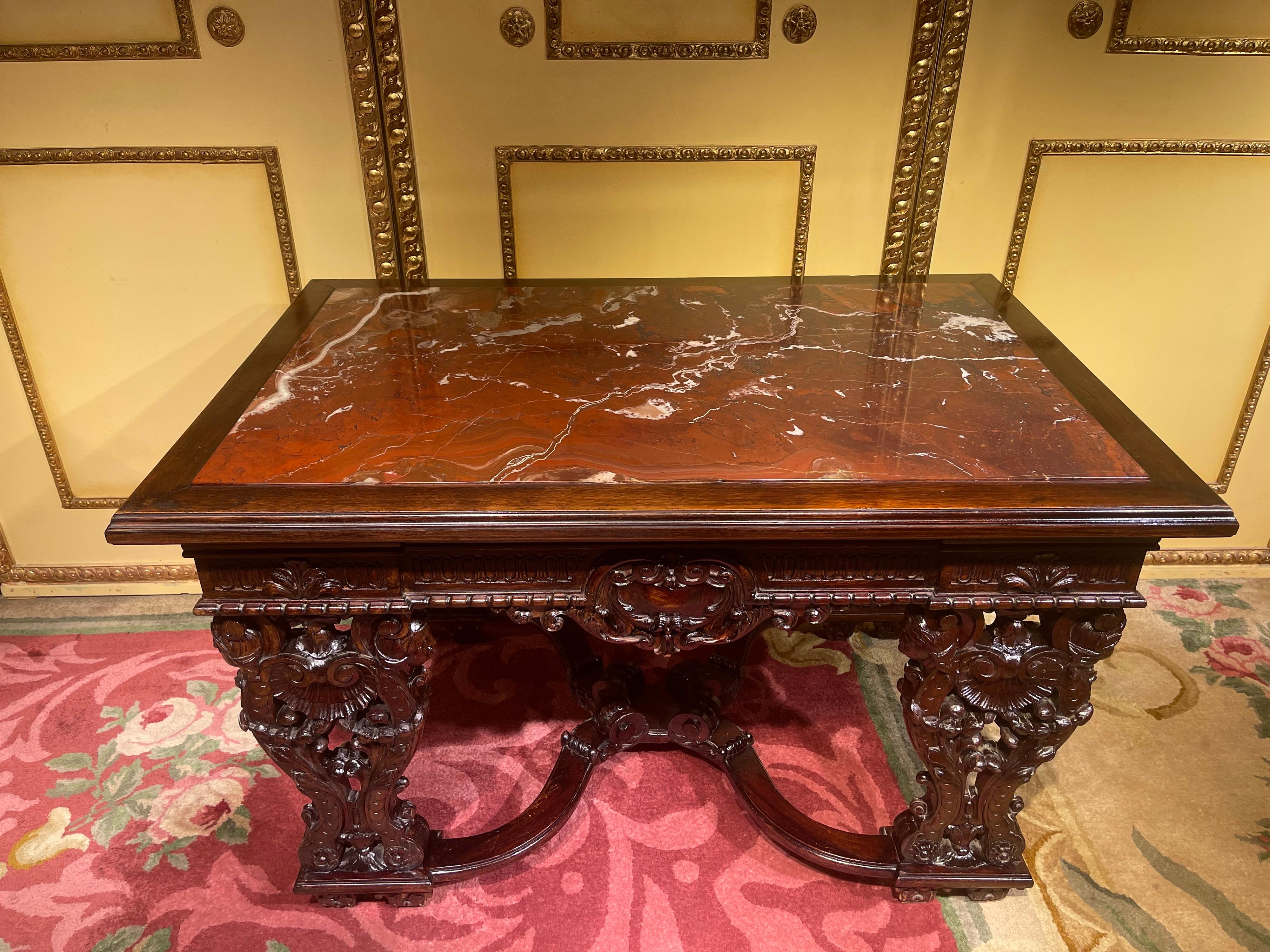 Stately historicism salon table, solid oak, around 1880

Very richly carved base. Legs connected with X-shaped footbridge. Inserted mottled marble top plate. Overall a very impressive centerpiece. Germany, solid oak, hand-carved from the