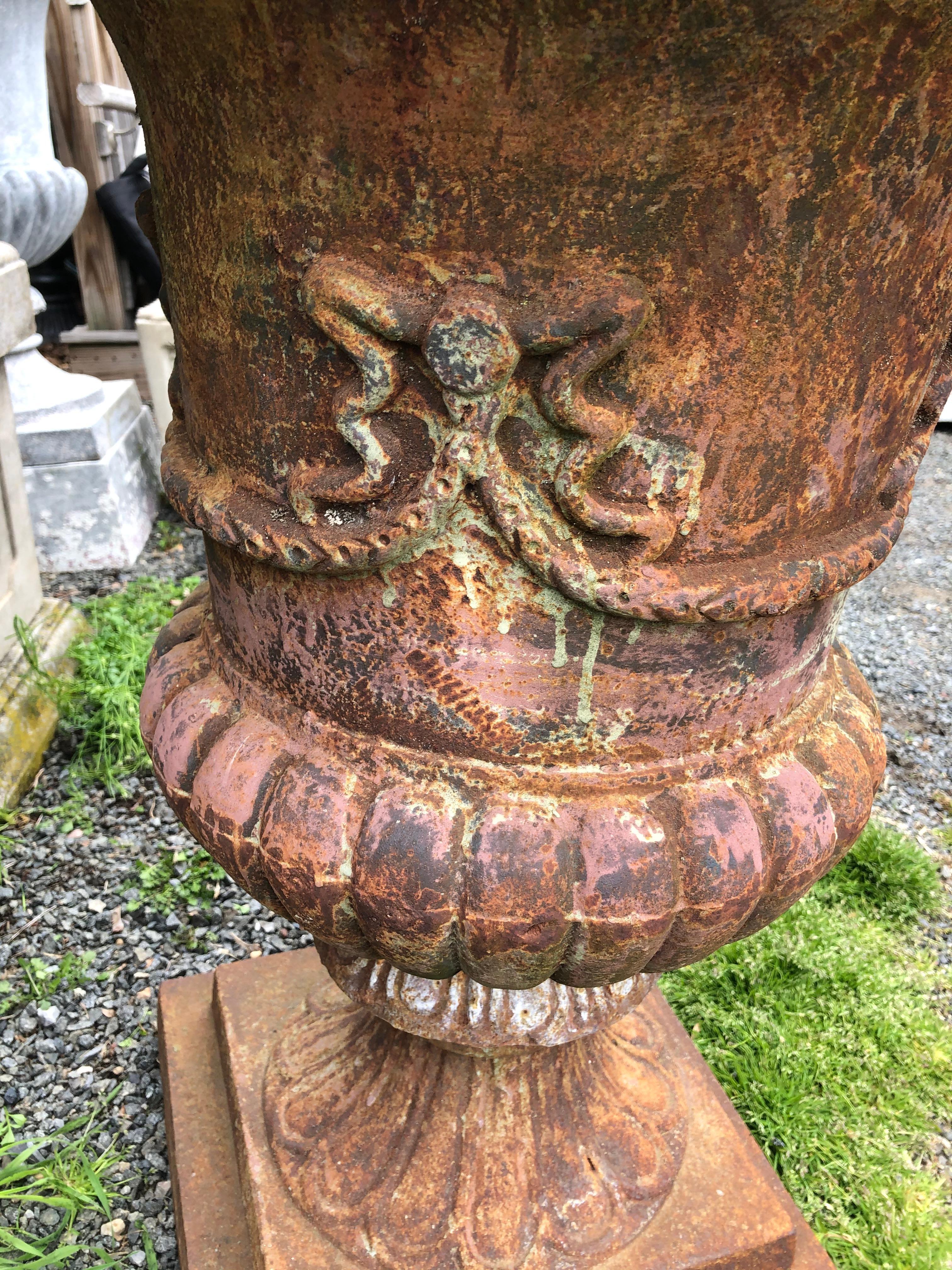 Neoclassical Stately Large Pair of Rust Colored Cast Iron Urn Planters