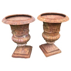 Vintage Stately Large Pair of Rust Colored Cast Iron Urn Planters