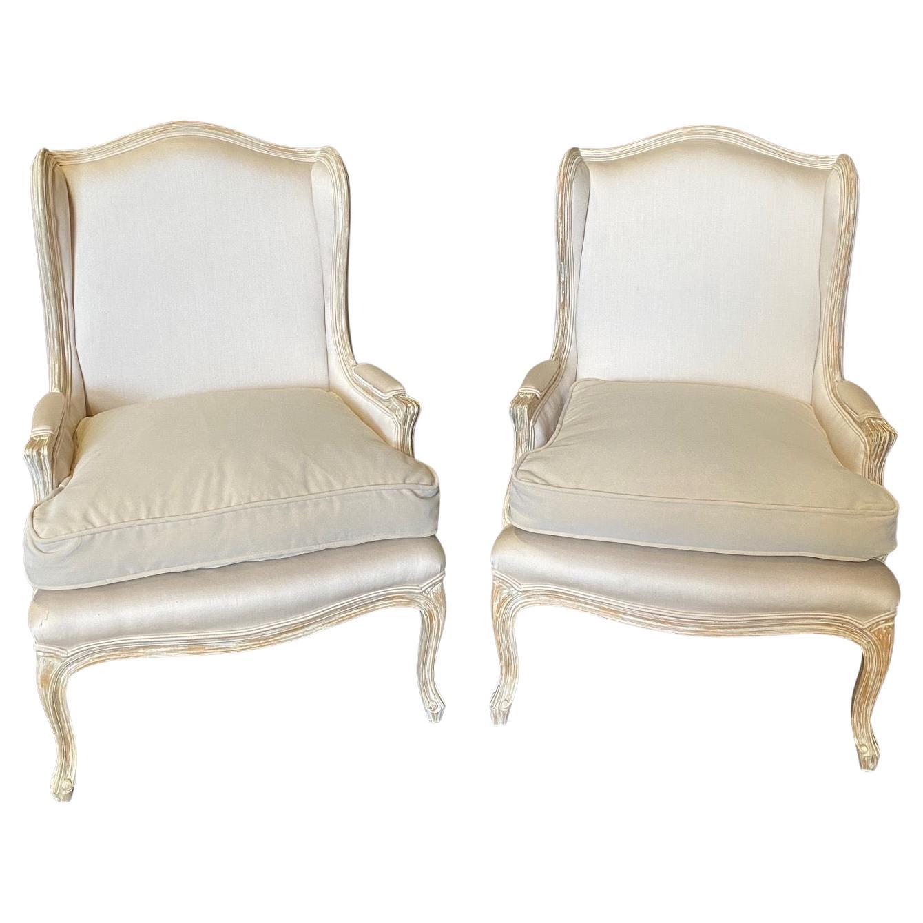 Stately Pair of French Louis XV Style White Bergere Wing Chairs L For Sale