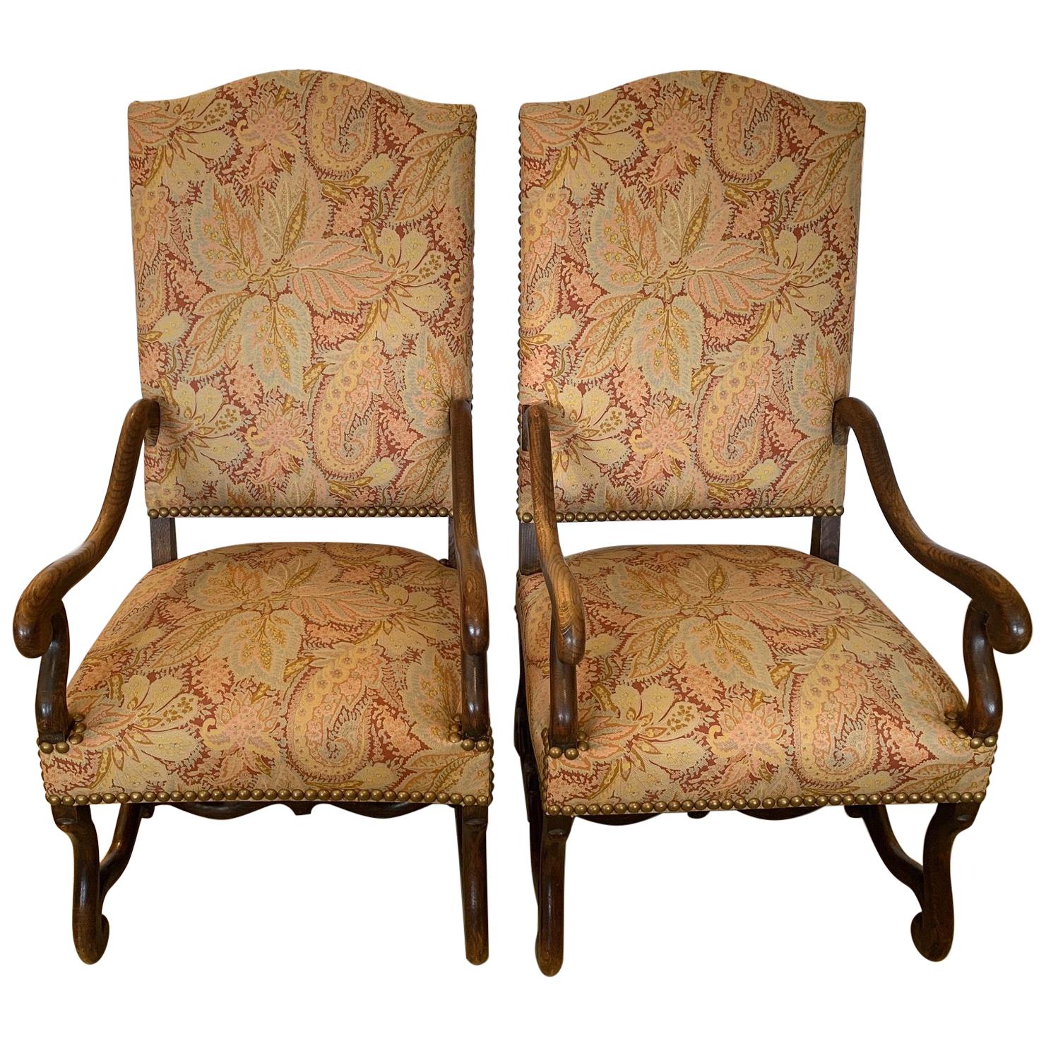 Stately Pair of High Back Antique Walnut and Upholstered Armchairs