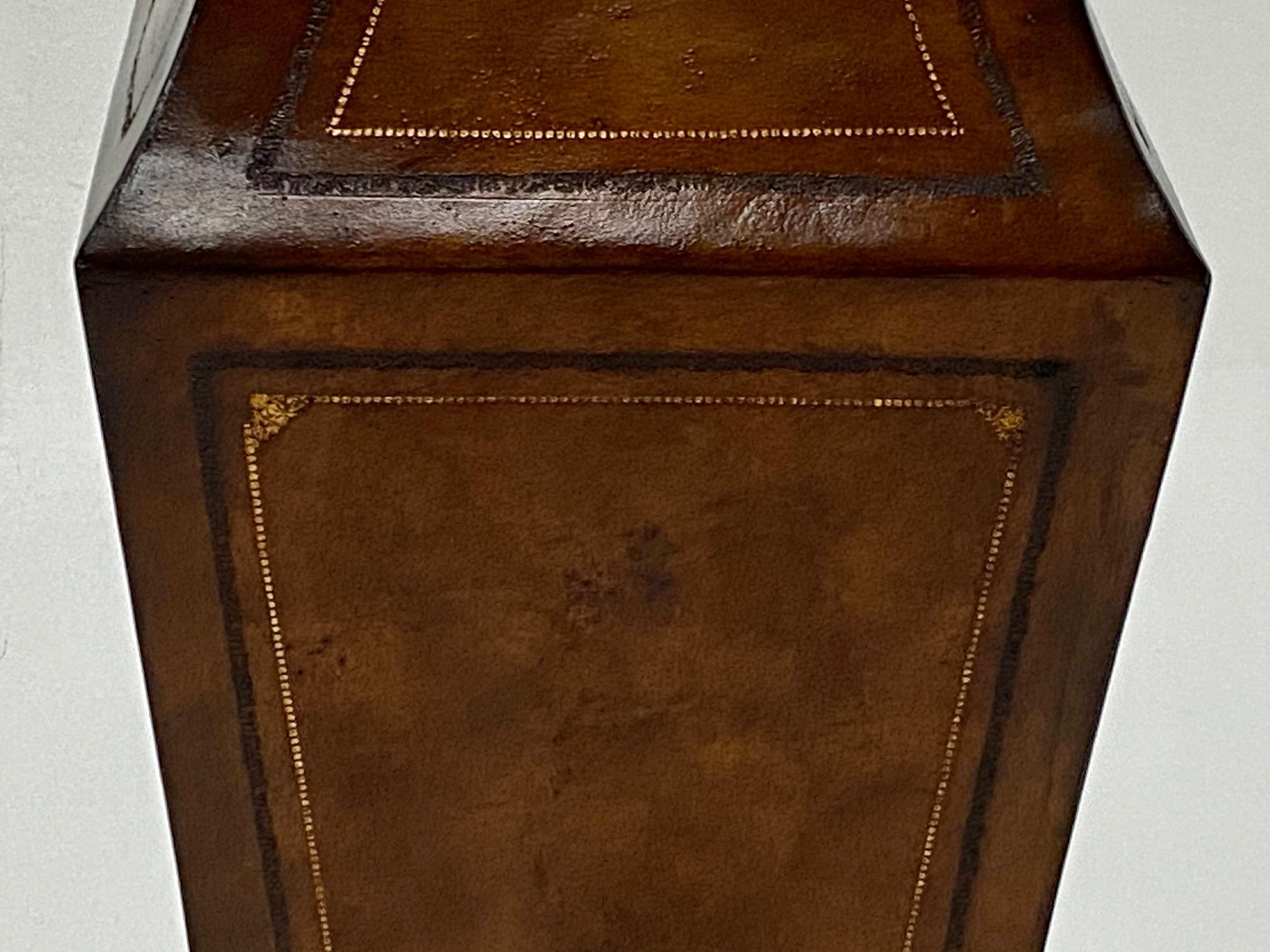 Late 20th Century Stately Pair of Leather Wrapped Pedestals with Gold Embossed Decoration