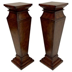 Stately Pair of Leather Wrapped Pedestals with Gold Embossed Decoration