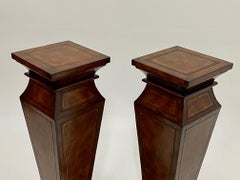 Stately Pair of Leather Wrapped Pedestals with Gold Embossed Decoration