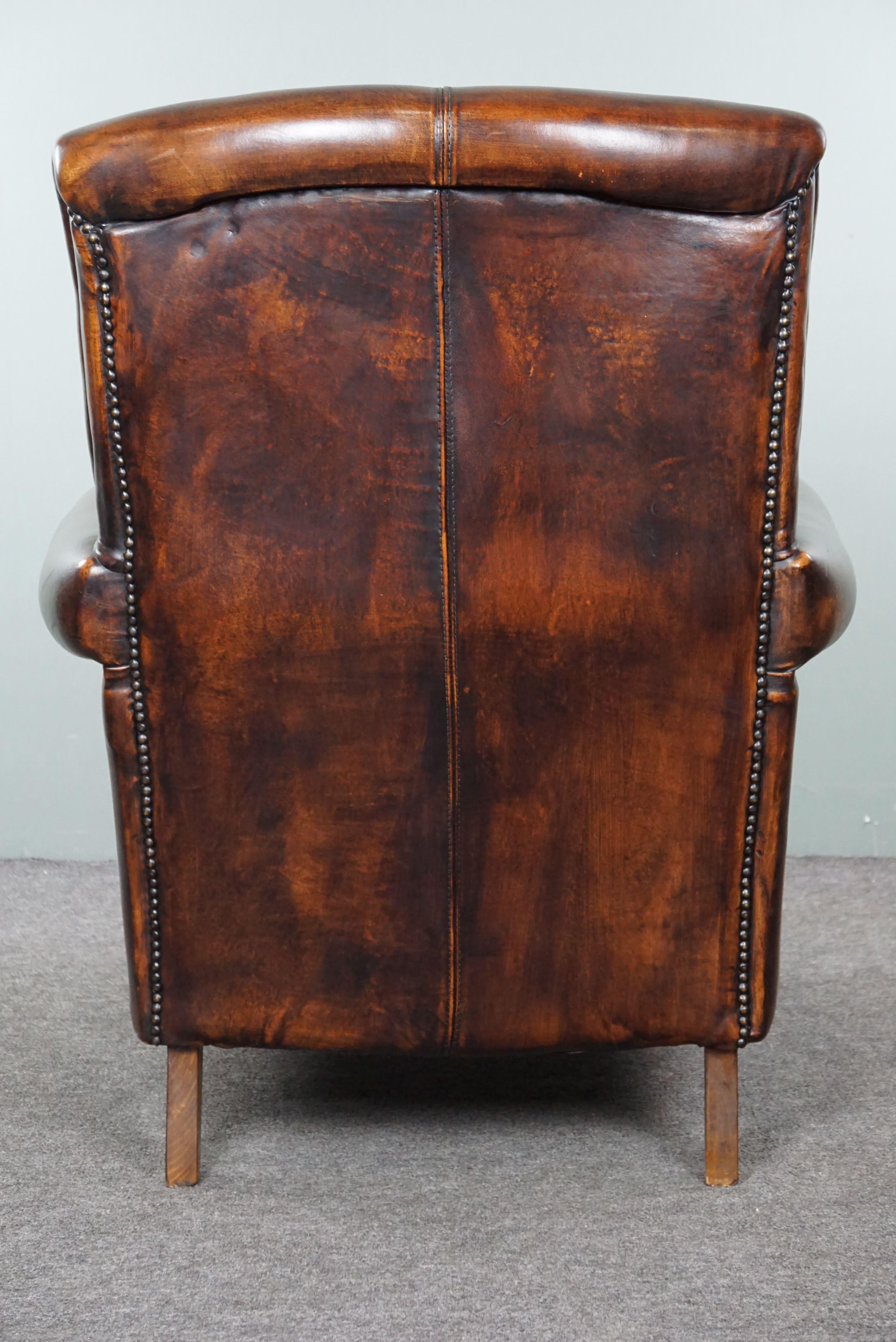 Late 20th Century Stately sheep leather armchair, comfortable seat, and high back For Sale