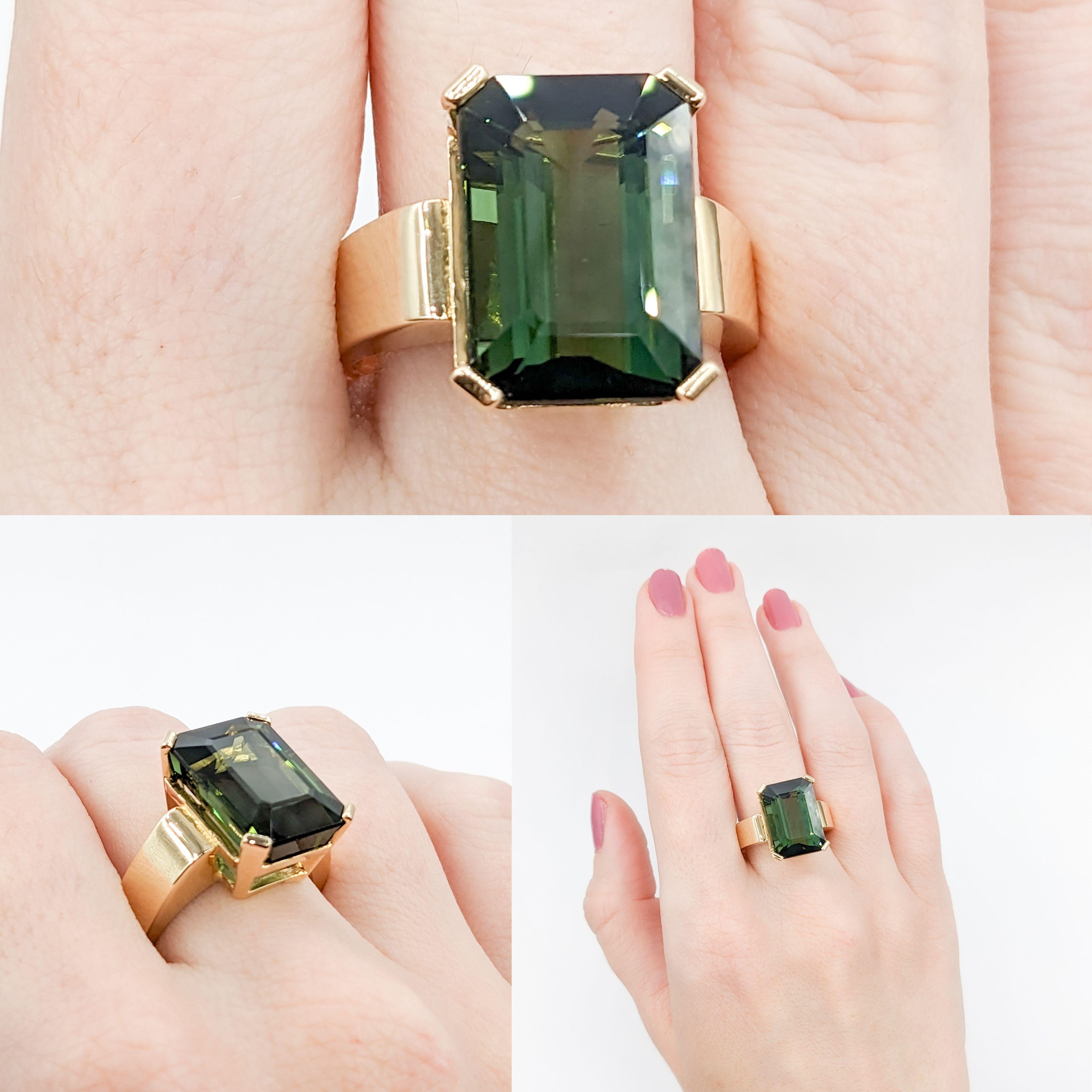 Statement 13.50ct Green Tourmaline Cocktail Ring

Discover the timeless beauty embodied in this stunning ring, a true masterpiece crafted in premium 14k yellow gold. At its heart lies a breathtaking 13.50ct deep green Tourmaline, captivating the