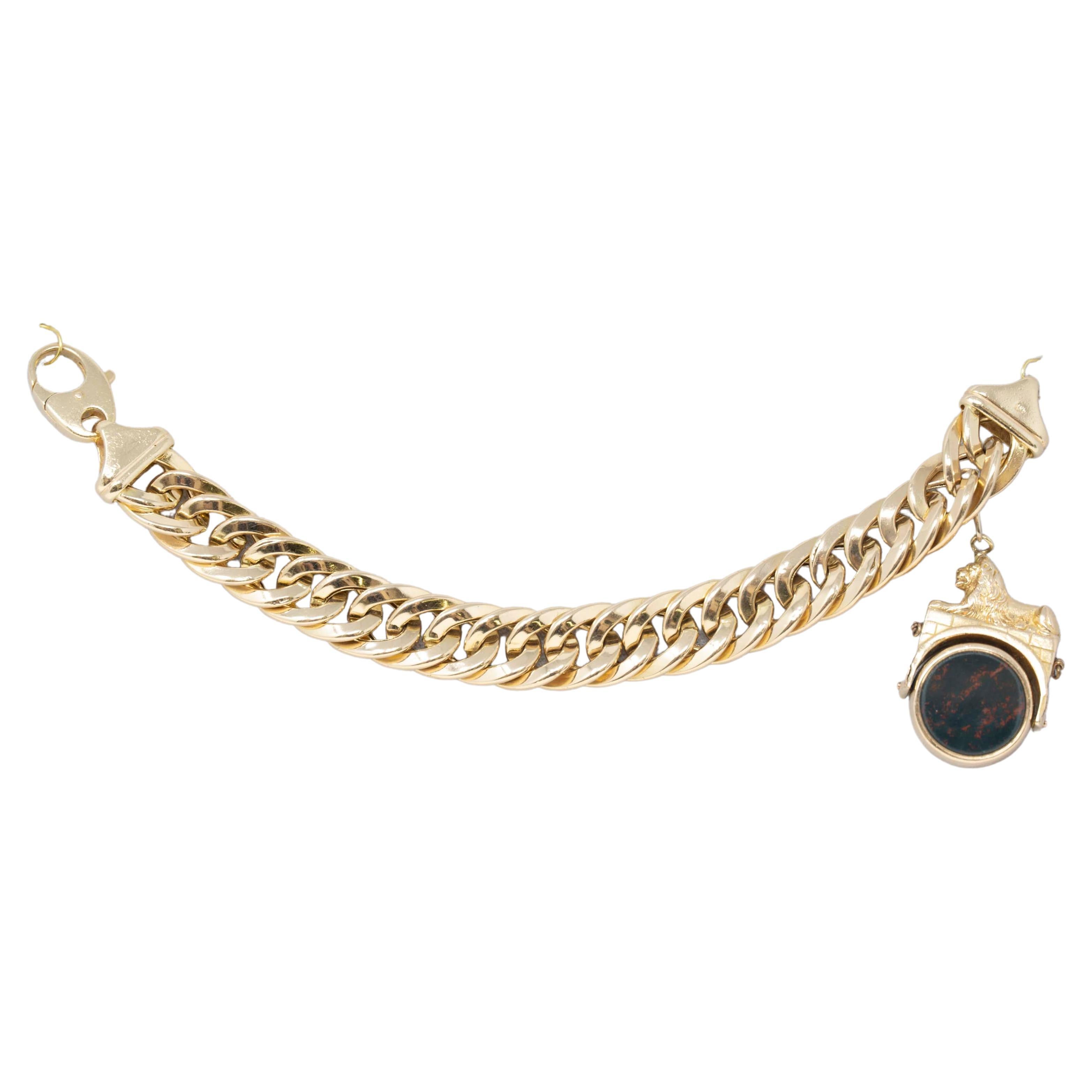 Statement 14k Gold Bracelet with Bloodstone and Conch Shell Spin FOB Pendant For Sale