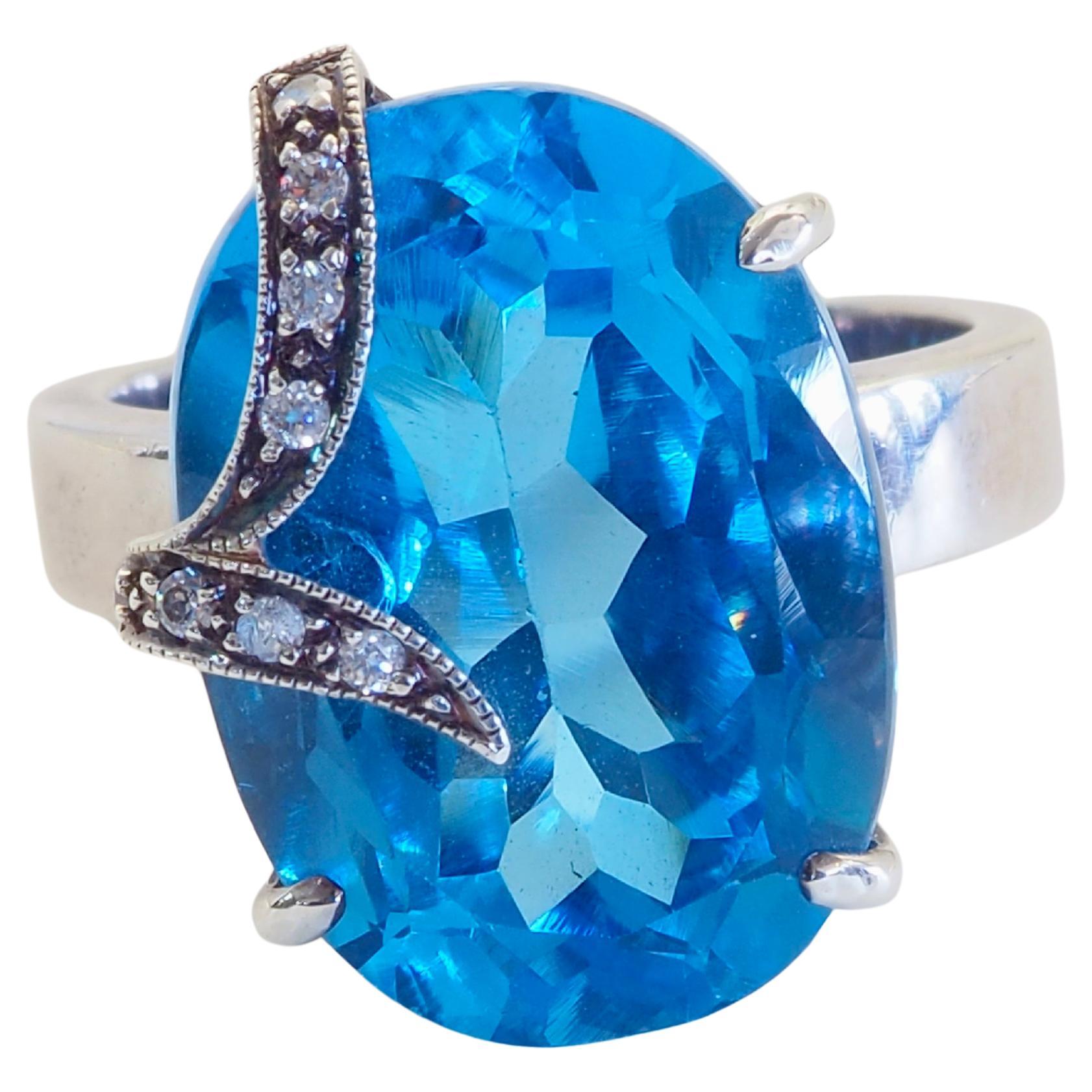 Statement 17.09ct Oval Blue Topaz
White Quartz Fine Sterling Silver Ring